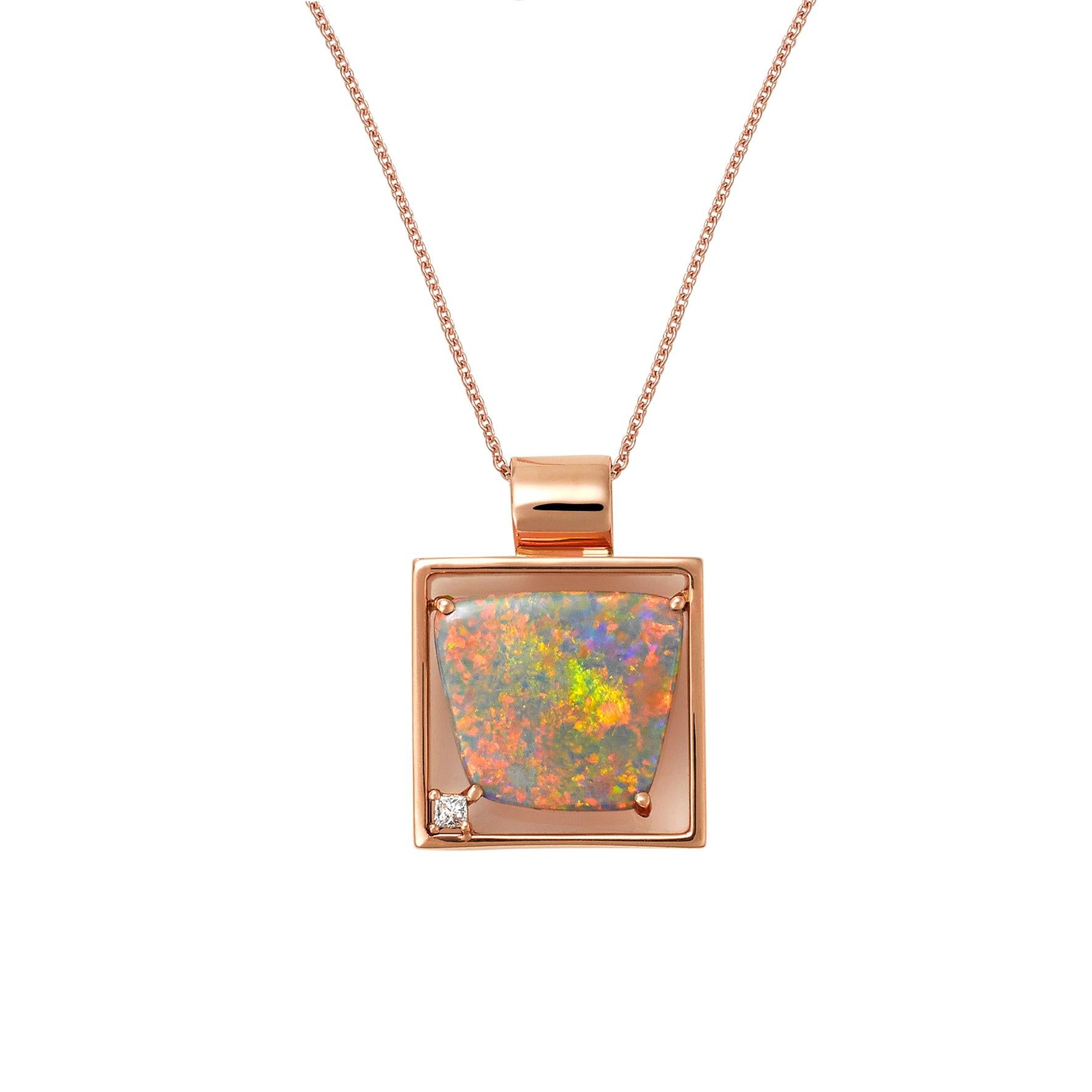 Giulians handcrafted 18 karat rose gold Australian black opal and diamond pendant necklace.  This pendant features a 4.28ct natural solid black opal, from Lightning Ridge NSW, with a light colour and bright green and pink play-of-color.  The opal is