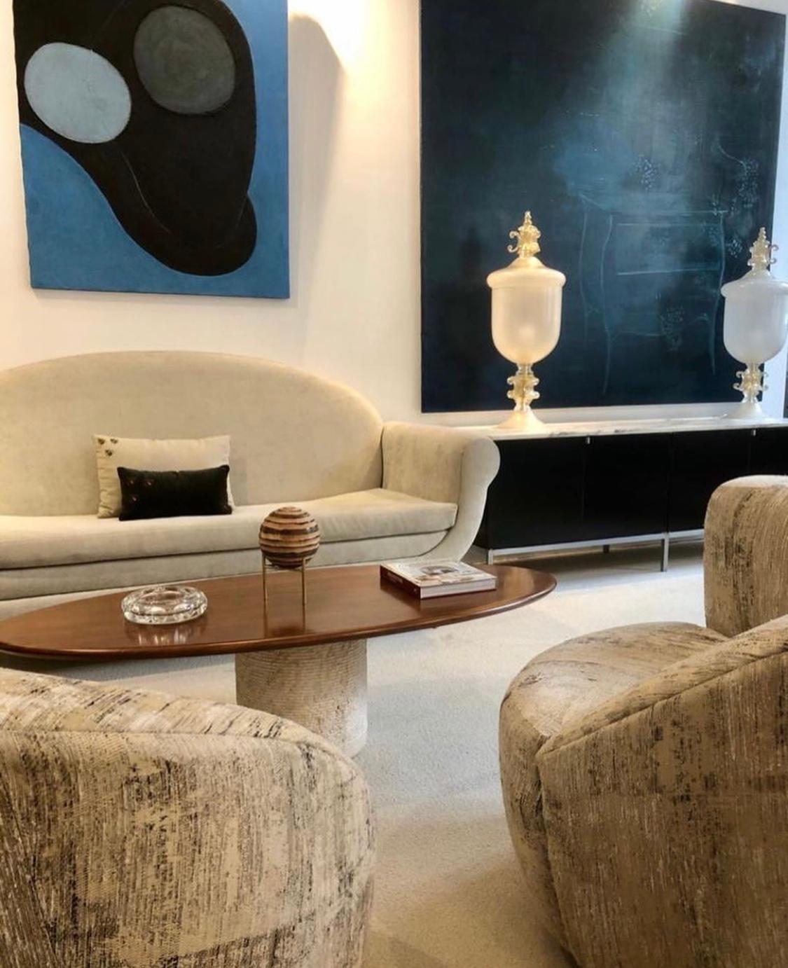 Like a surfboard this atomic tabletop handcrafted and made of polished wood, with a travertine central circular leg is extremely elegant. This exceptional piece is hand signed by Giullio Lazzotti itself.
Giulio Lazzotti is an Italian Designer, he