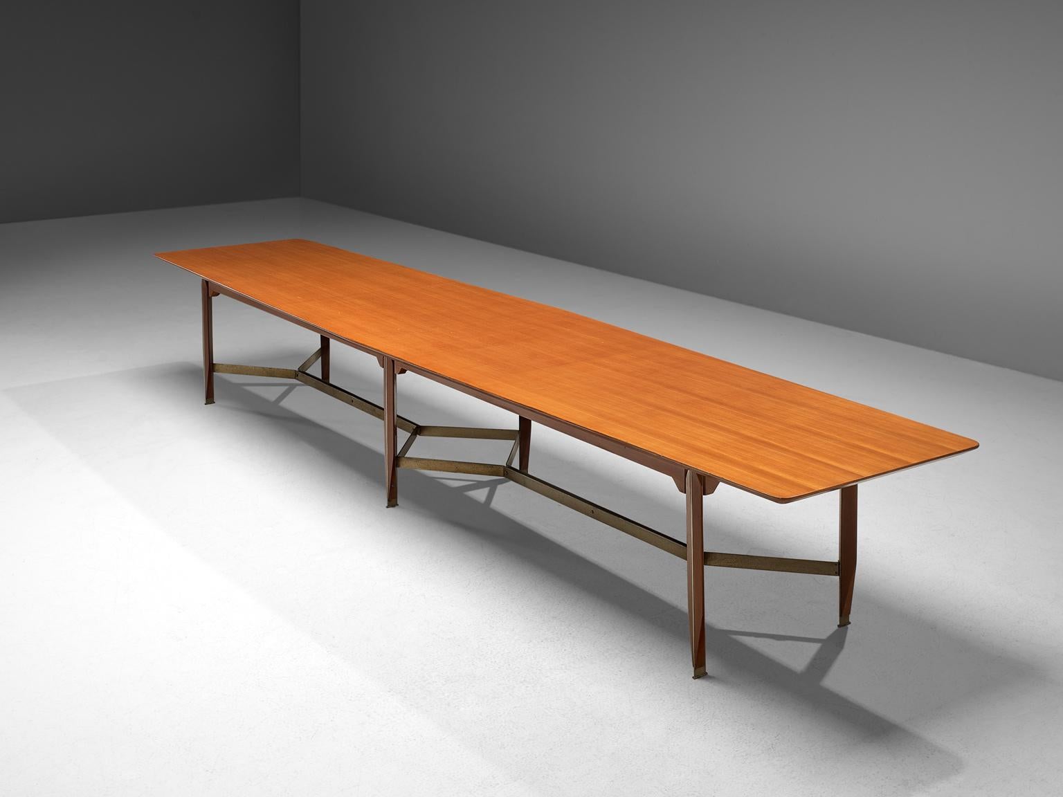 Giulio Moscatelli, conference table, teak, metal and brass, Italy, 1970s.

Very lage conference table designed by Giulio Moscatelli. The tabletop is slightly boat shaped and features a notable frame. The six legs are made of teak and a metal strip,