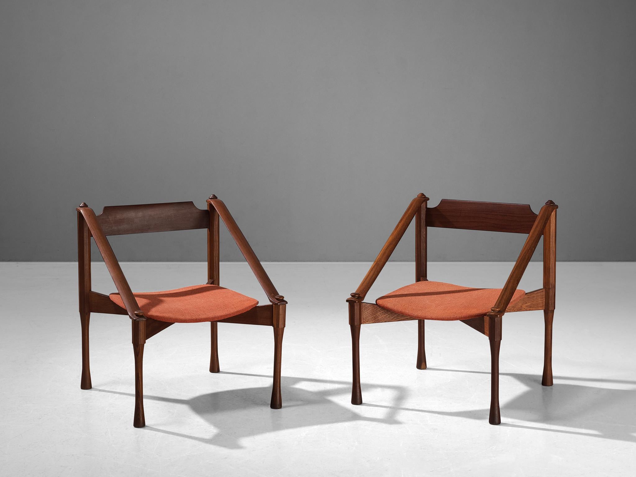 Giulio Moscatelli, pair of armchairs, teak, fabric, Italy, ca. 1950

This pair of armchairs by Giulio Moscatelli is distinctive in its execution. The legs are beautifully sculpted, showing concave carvings. The diagonal placed armrests give a sense
