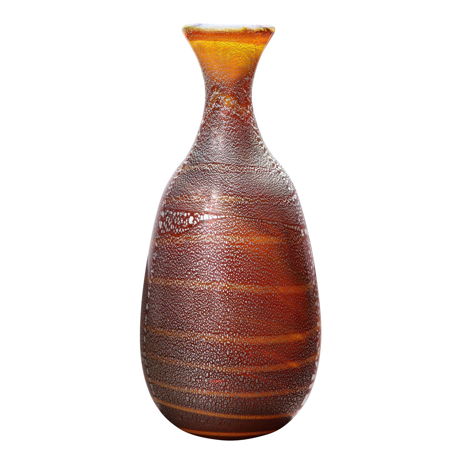 Hand-blown glass vase, amber with silver foil and spiral design, by Giulio Radi for A.V.E.M., Murano Italy, ca 1950. The coloration and silver foil make this piece sublime.

Reference:
AVEM Artistic Production 1932-1972 by Marc Heiremans