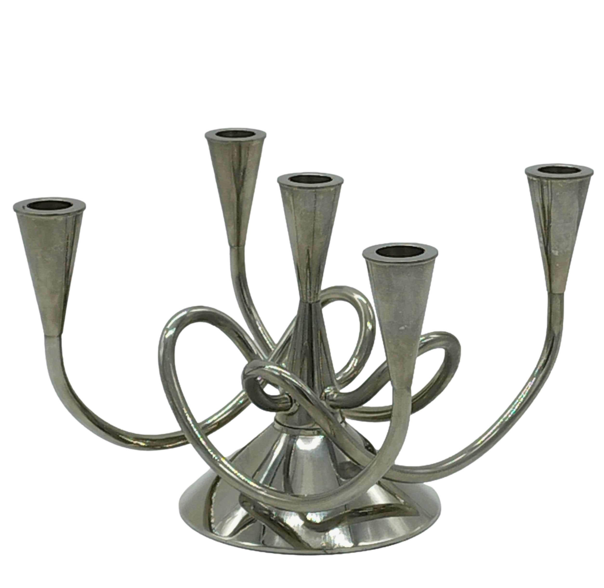 Matthew Boulton II' candelabra in brass with polished nickel finish, with 5 arms and distinguished by the characteristic grid, designed by Giuseppe Chigiotti for Driade 1970.
