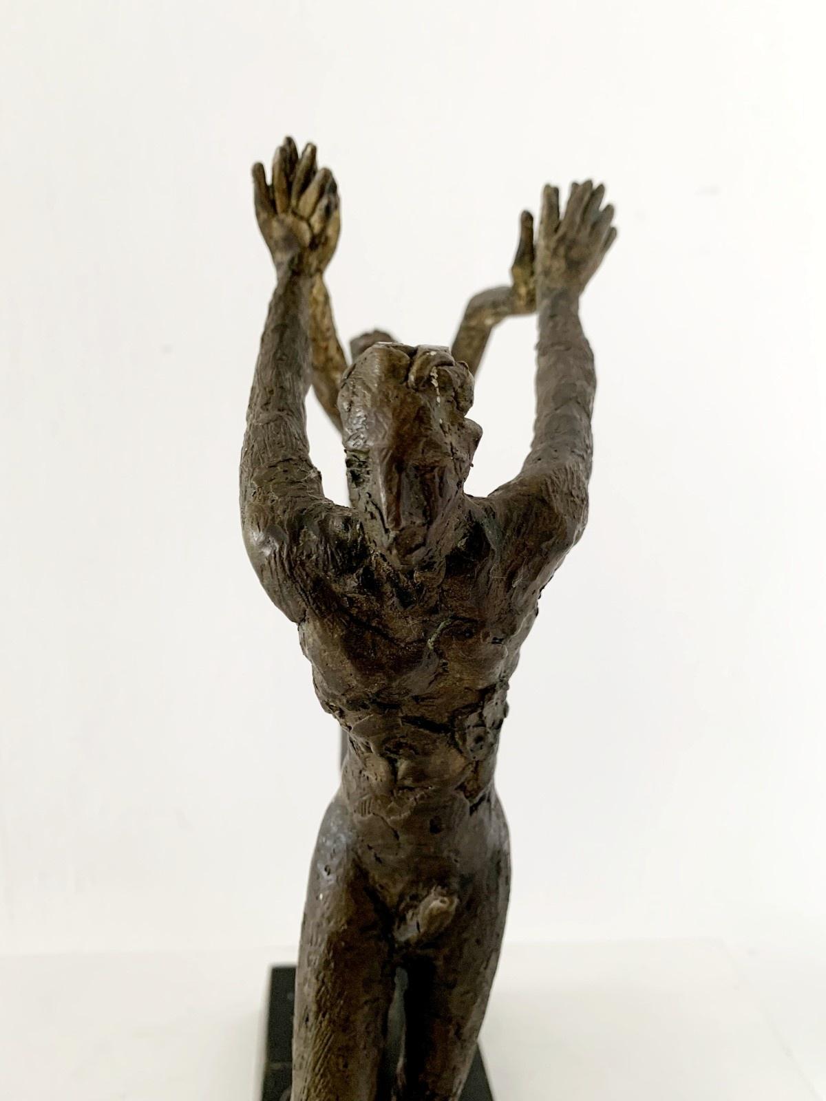 Contemporary bronze figurative sculpture of couple dancing together by Italian artist, professor Giuseppe del Debbio. Sculpture is signed on the base. Couple consists of man and a woman who are holding hands in dynamic, almost acrobatic