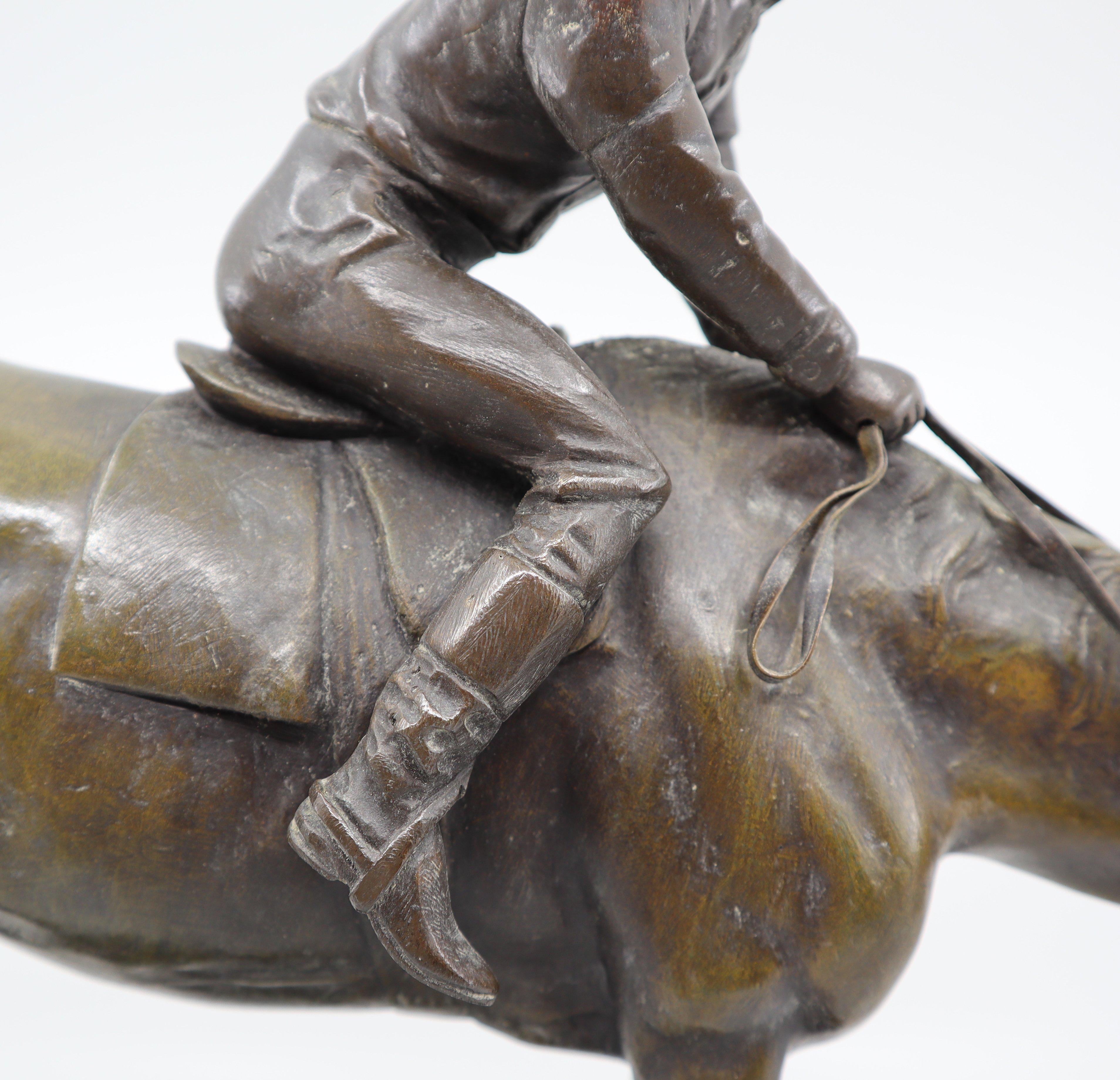 A bronze equestrian statue of a Jockey on his horse by Italian sculptor , G. Ferrari 19th Century  
Giuseppe Ferrari was an Italian sculptor born in 1843. His work portrayed figures and groups in a very realistic manner.

The statue is in excellent