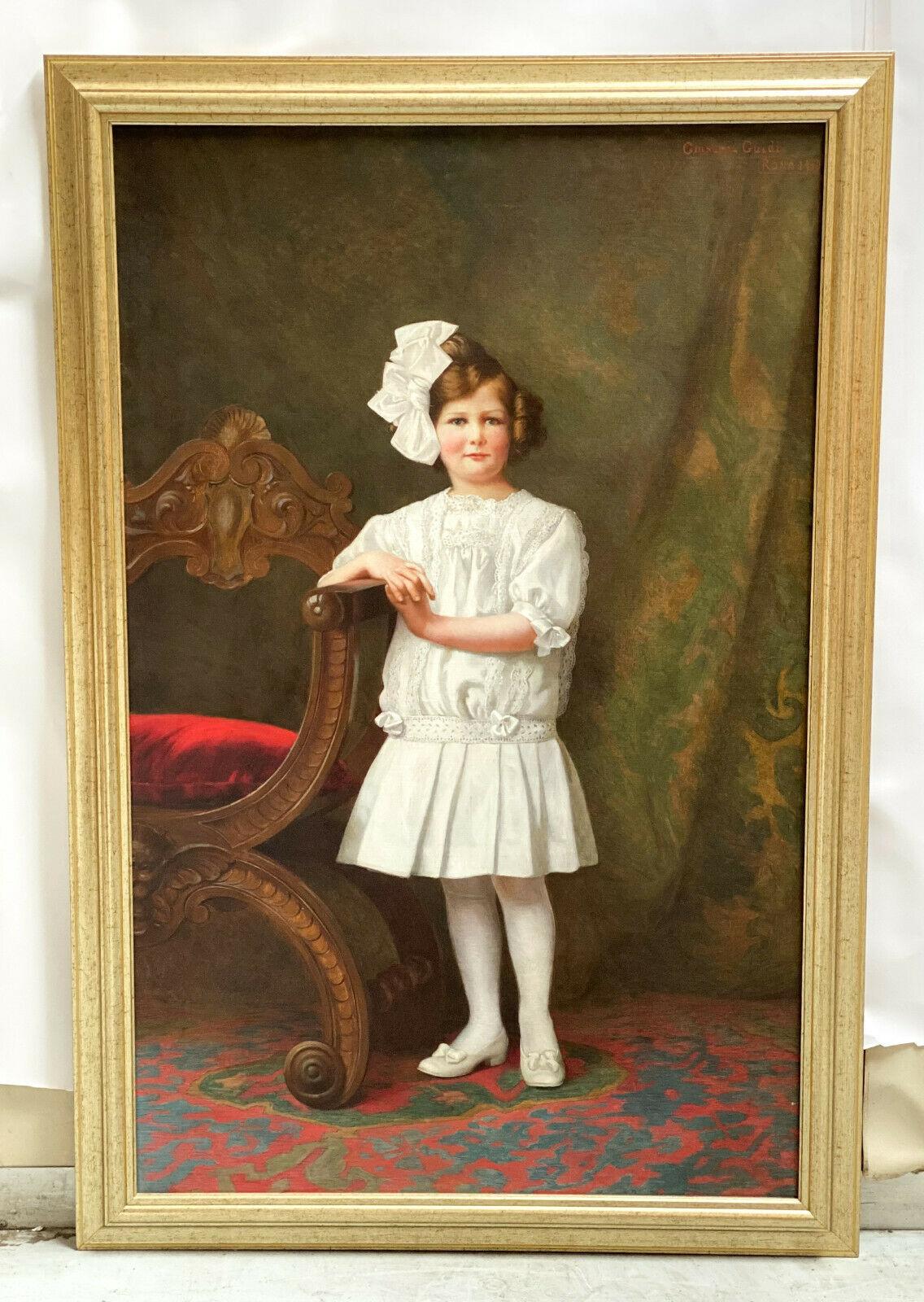 Giuseppe guidi oil on canvas young girl in White Dress, 1910

The painting depicts a young girl in a wearing a white dress and headband leaning against a chair against a draped backdrop. Artist signed 