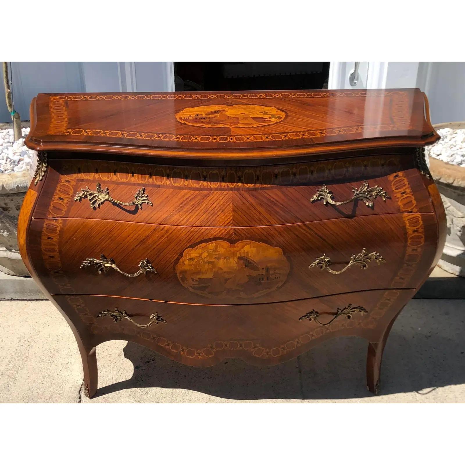 Giuseppe Maggiolini Style Inlaid Mahogany Bombay Commode by Charles & Charles. Made by Charles & Charles in the manner of Giuseppe Maggiolini. It is an outstanding example with amazing inlaid decoration on the front as well as the top including a