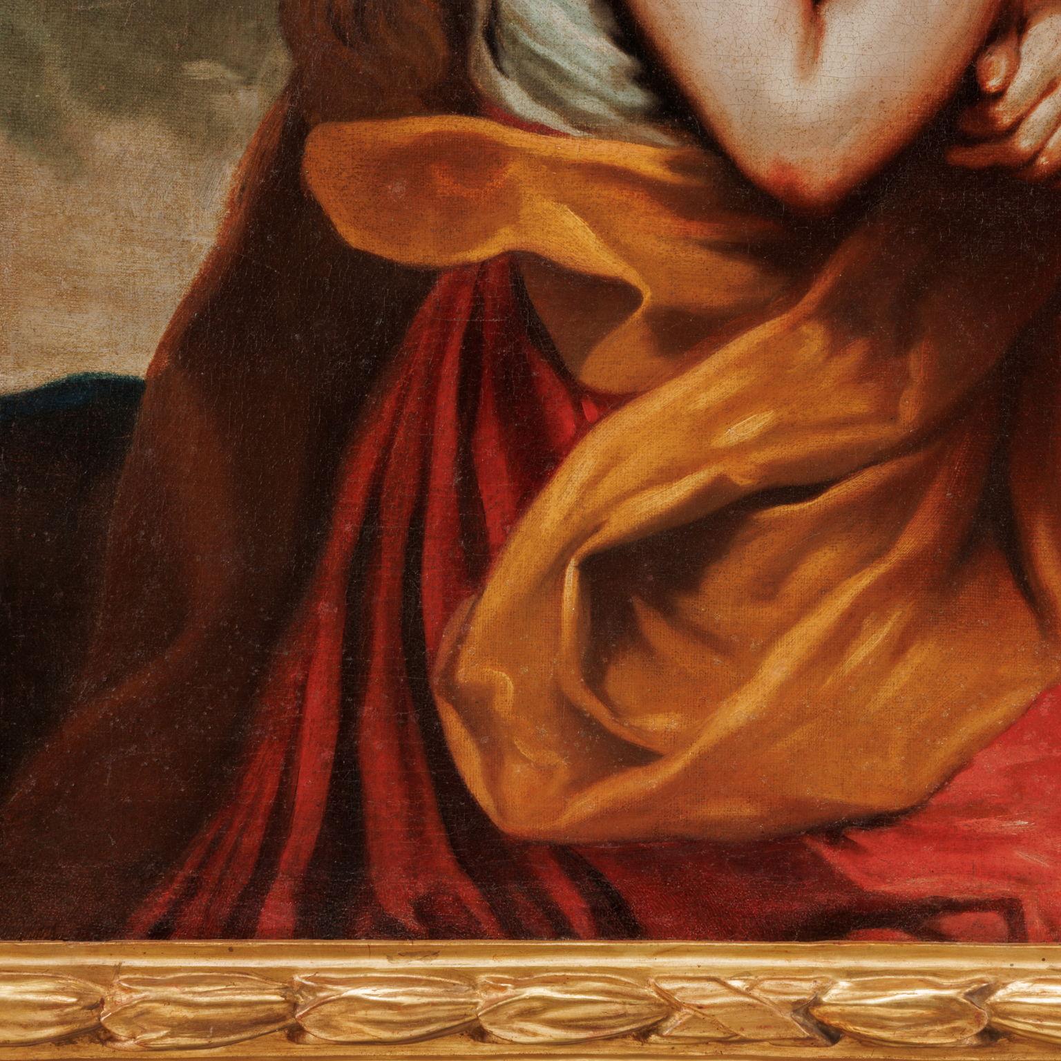 Gemalt in Öl auf Leinwand. Die Figur der Magdalena ist hier der Tradition entsprechend mit langen roten Haaren dargestellt; mit einer Geste trauriger Hingabe richtet sie ihren Blick auf das Kruzifix, das sie mit der linken Hand an den rechten Arm