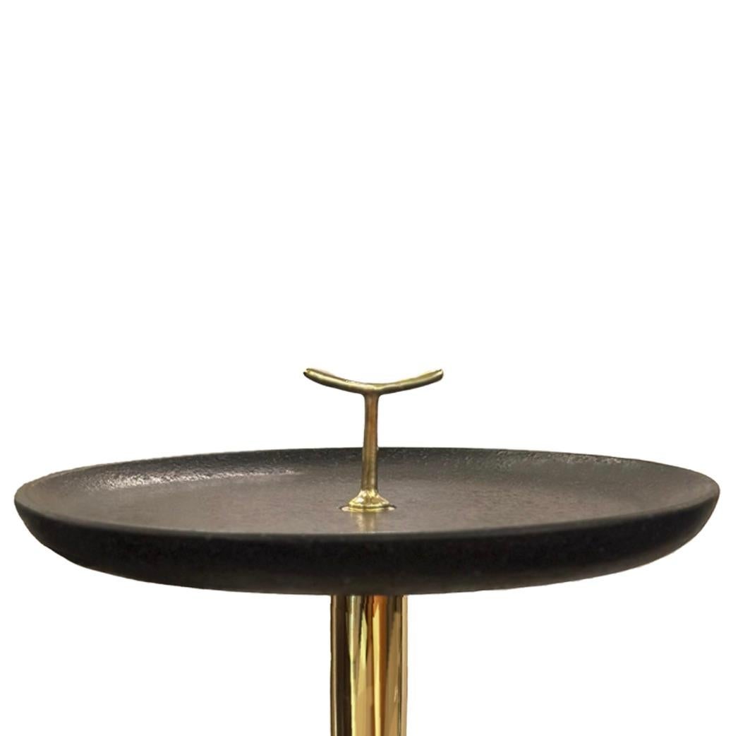 This refined mid-century occasional table, attributed to Giuseppe Ostuni, captures the spirit of an era defined by elegance, experimentation, and Italian ingenuity.

Founder of Oluce in 1945 — Italy’s oldest lighting company still in operation —