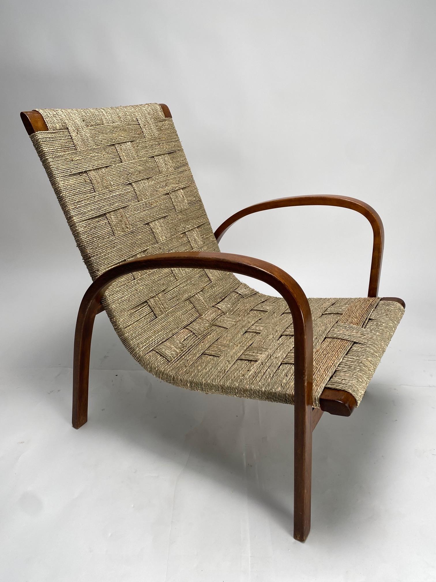 Rare armchair  in cured wood and rope, made in Italy in the 1940s and attributable to the famous Italian architect and designer Giuseppe Pagano Pogatsching.

The rope has been completely handcrafted by our restoration laboratory following ancient