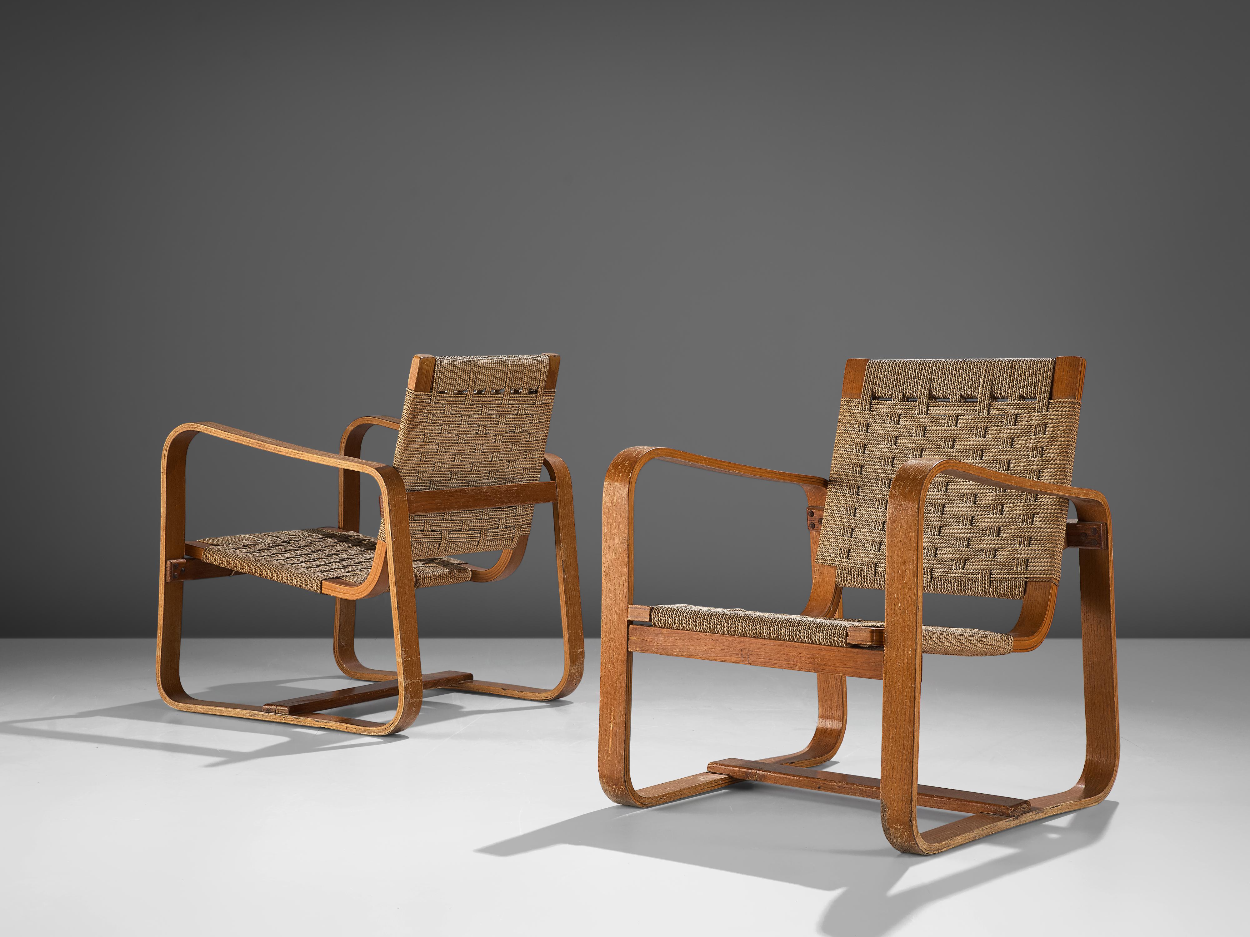 Giuseppe Pagano Pogatschnig, pair or lounge chairs, beech, natural cord, Italy, 1940

Giuseppe Pagano Pogatschnig (1896-1945) designed this bentwood armchair initially in 1940 for ‘l’Università Bocconi di Milano’. Characteristic are the two
