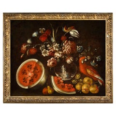 Giuseppe Pesci (Parma ?- 1722)  " Still Life with Fruit, Flowers and a Parrot " 