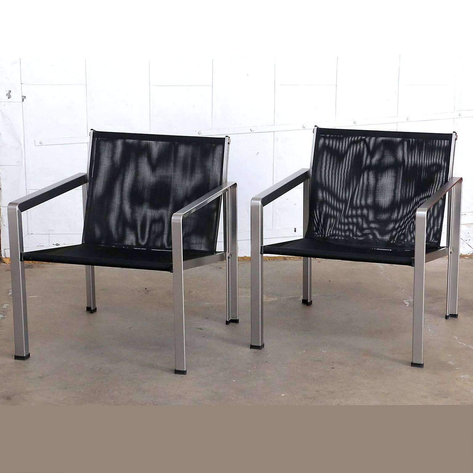 Rare pair of Giuseppe Raimondi design aluminum modernist lounge or cube chairs made in Italy. Each constructed from flat-bar aircraft style aluminum frames with a brushed finish. Upholstered with fine mesh slings suspended from round bars. Each