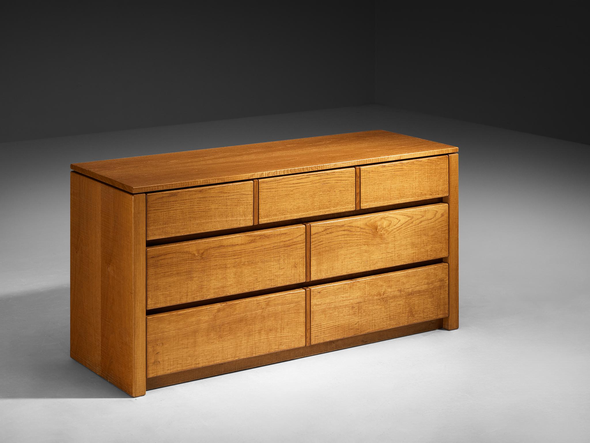 Giuseppe Rivadossi for Officina Rivadossi, cabinet, chestnut, Italy, 1980s

An exceptional chest of drawers by the Italian sculptor and designer Giuseppe Rivadossi, featuring a high level of craftsmanship in woodwork. Seven drawers give access to