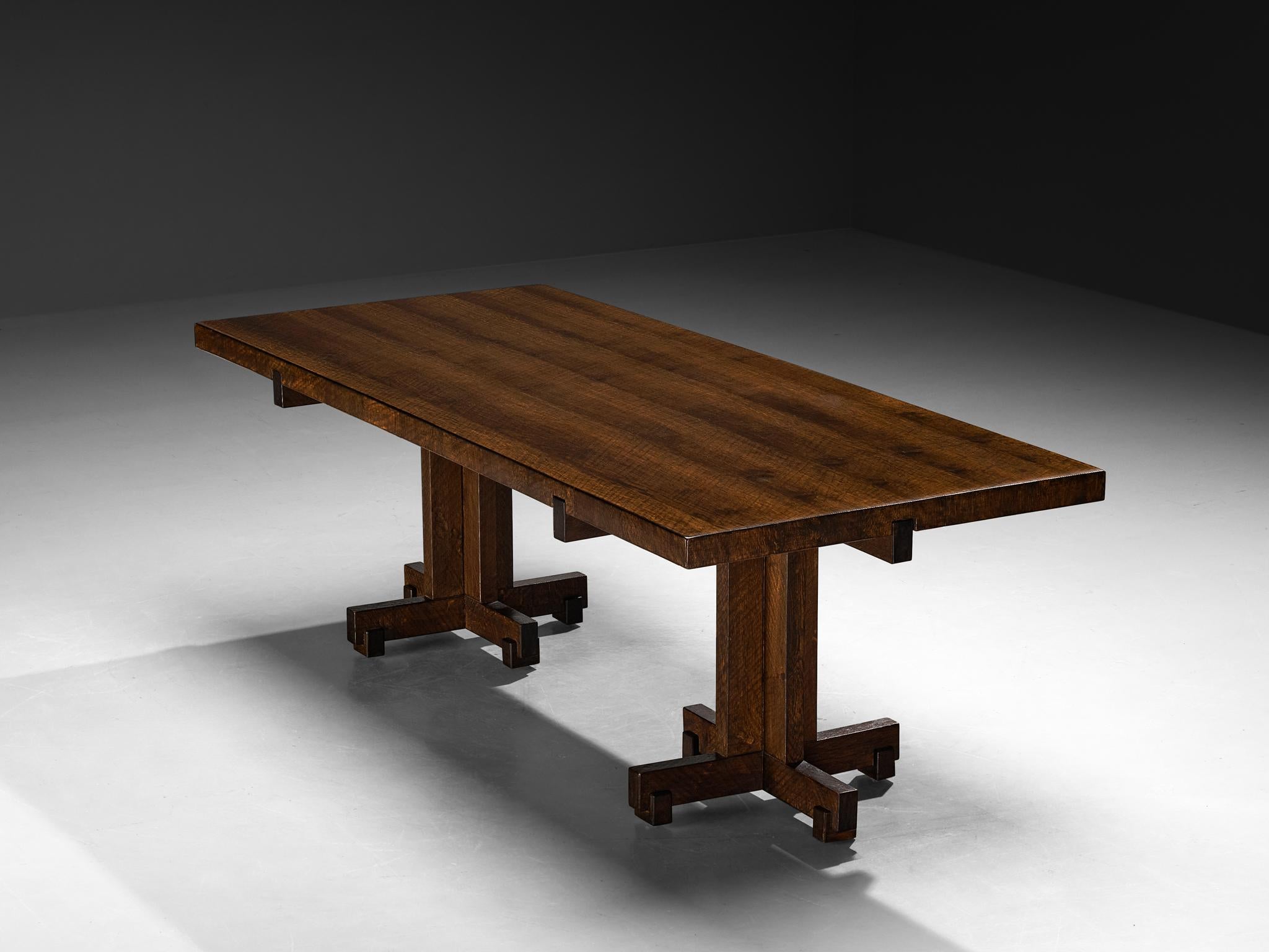 Giuseppe Rivadossi dining table, oak, Italy, 1968

This exceptional dining table, crafted by Giuseppe Rivadossi in the 1960s, showcases the mastery of Italian woodworking. Made from oak, it features a unique cross-shaped double base, providing both