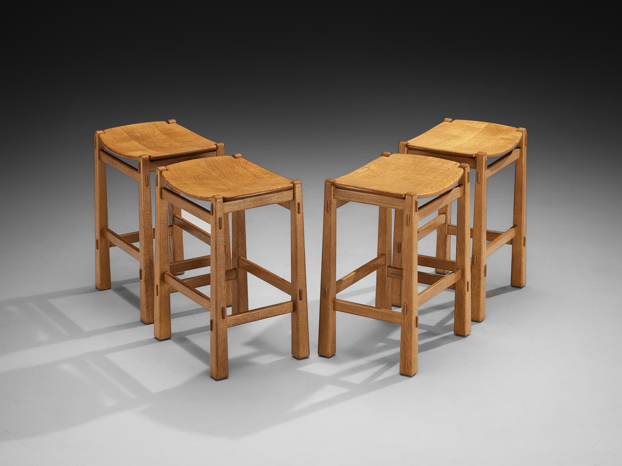 Giuseppe Rivadossi for Officina Rivadossi, stools, oak, Italy, 1980s

These lovely stools are a design by Giuseppe Rivadossi. The material used to make these stools is oak, which shows a subtle textured relief on the surface of the wood. The stools