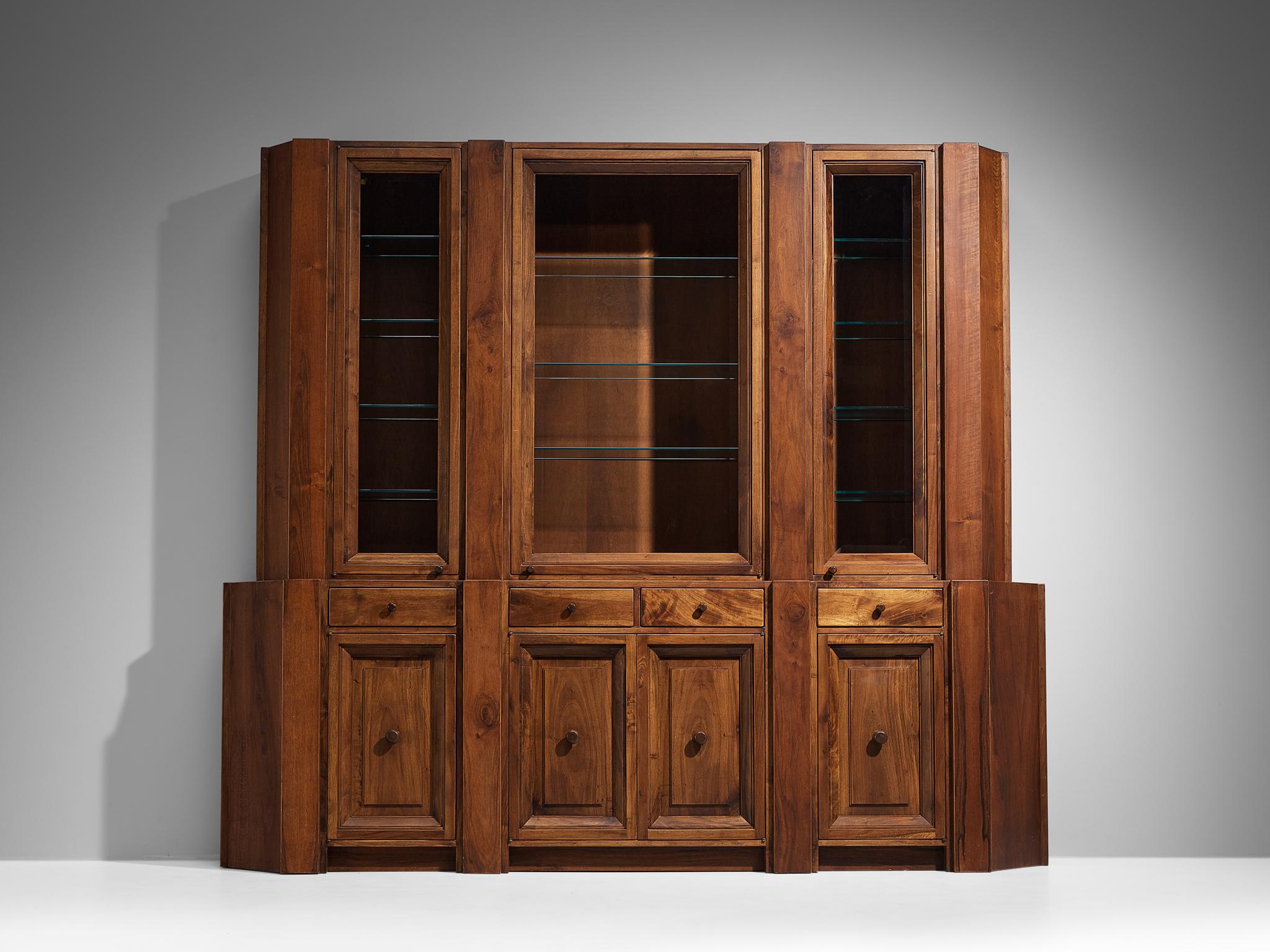 Giuseppe Rivadossi, library, walnut, Italy, 1970s

This impressive library is designed by Italian Giuseppe Rivadossi in the 1970s. The lower part of this piece is composed of large panels of walnut wood and small and elegant handles on the doors.