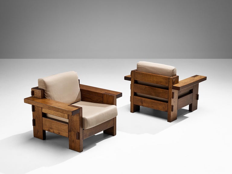 Giuseppe Rivadossi for Officina Rivadossi, pair of armchairs, oak, Italy, 1980s

An exceptional pair of monumental lounge chairs by the Italian sculptor and designer Giuseppe Rivadossi, featuring a high level of craftsmanship in woodwork. These