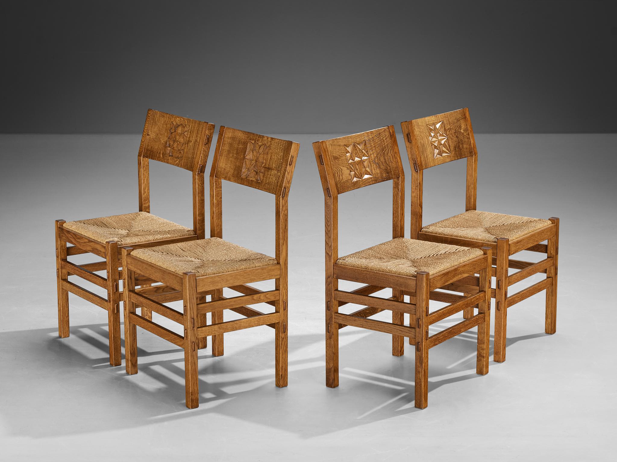 Giuseppe Rivadossi for Officina Rivadossi, set of four dining chairs, oak, straw, Italy, 1970s

An exceptional set of chairs by the Italian sculptor and designer Giuseppe Rivadossi. The chairs are architecturally built based on the assemblage of