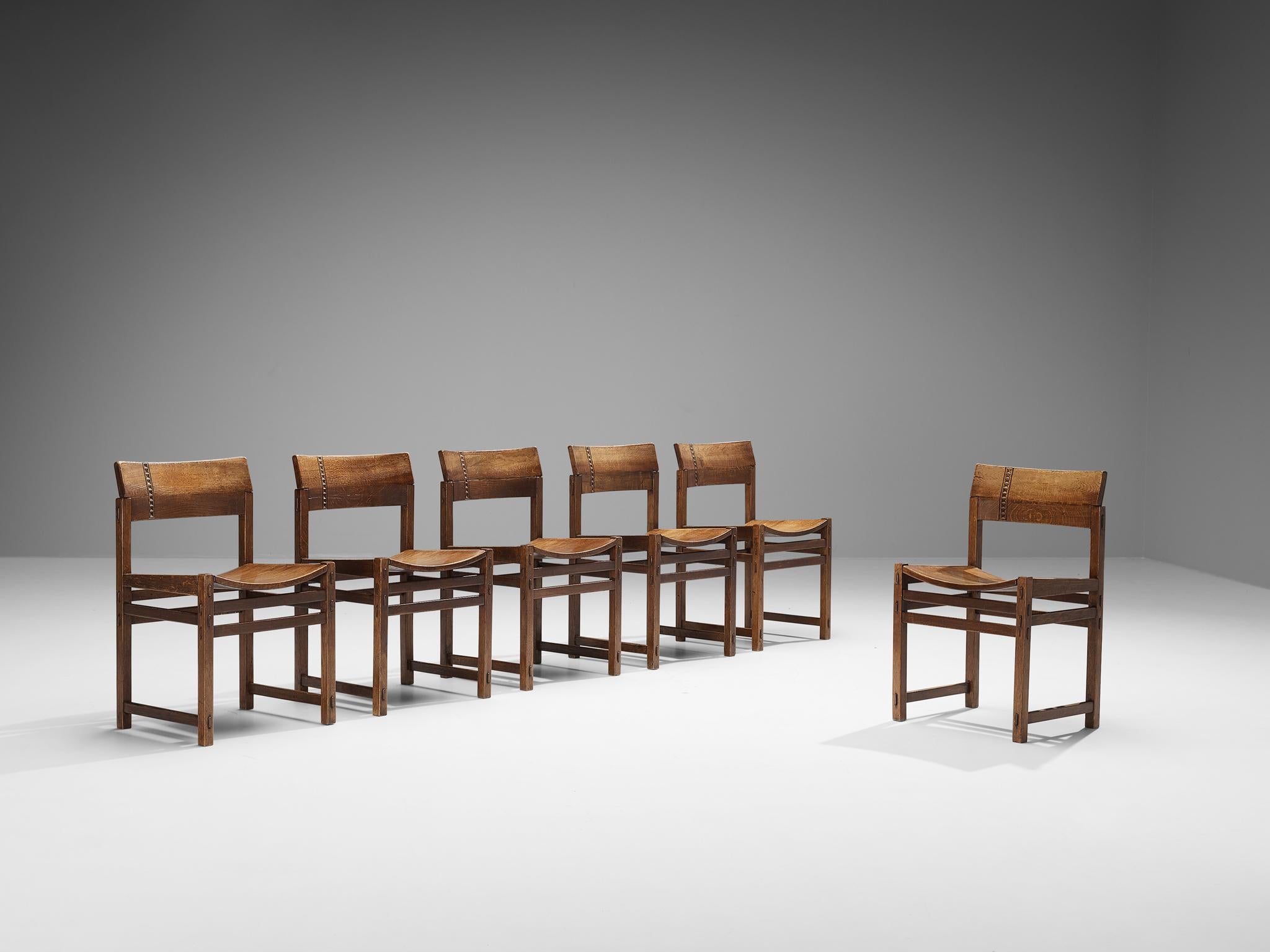 Giuseppe Rivadossi for Officina Rivadossi, set of six dining chairs, oak, Italy, 1970s

An exceptional set of chairs by the Italian sculptor and designer Giuseppe Rivadossi. The chairs are architecturally built based on the assemblage of parts