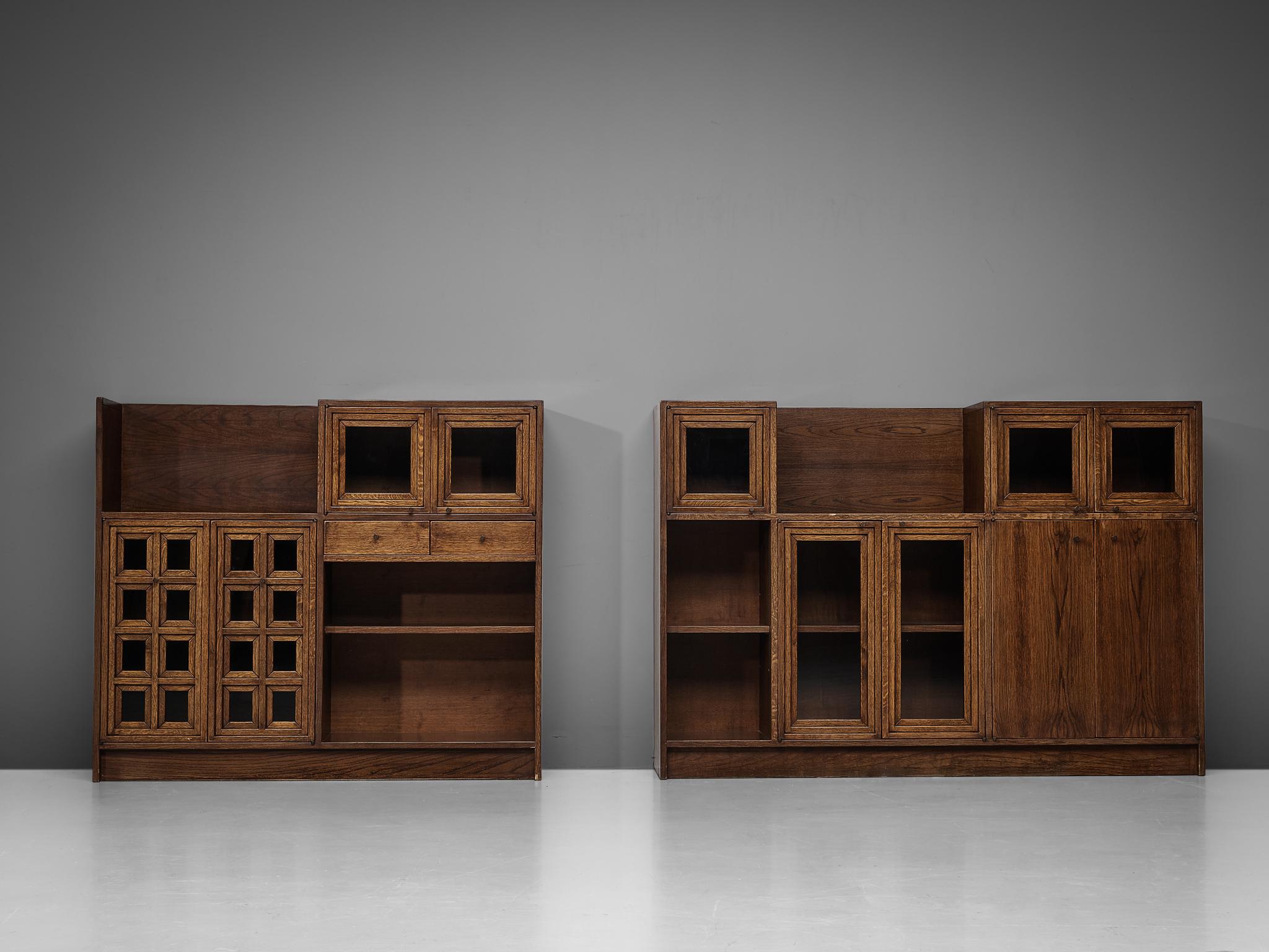 Giuseppe Rivadossi, cabinets, oak, glass, Italy, 1975.

An exceptional pair of cabinets by the Italian sculptor and designer Giuseppe Rivadossi, featuring a high level of craftsmanship in woodwork. The two pieces combined create a wonderful wall