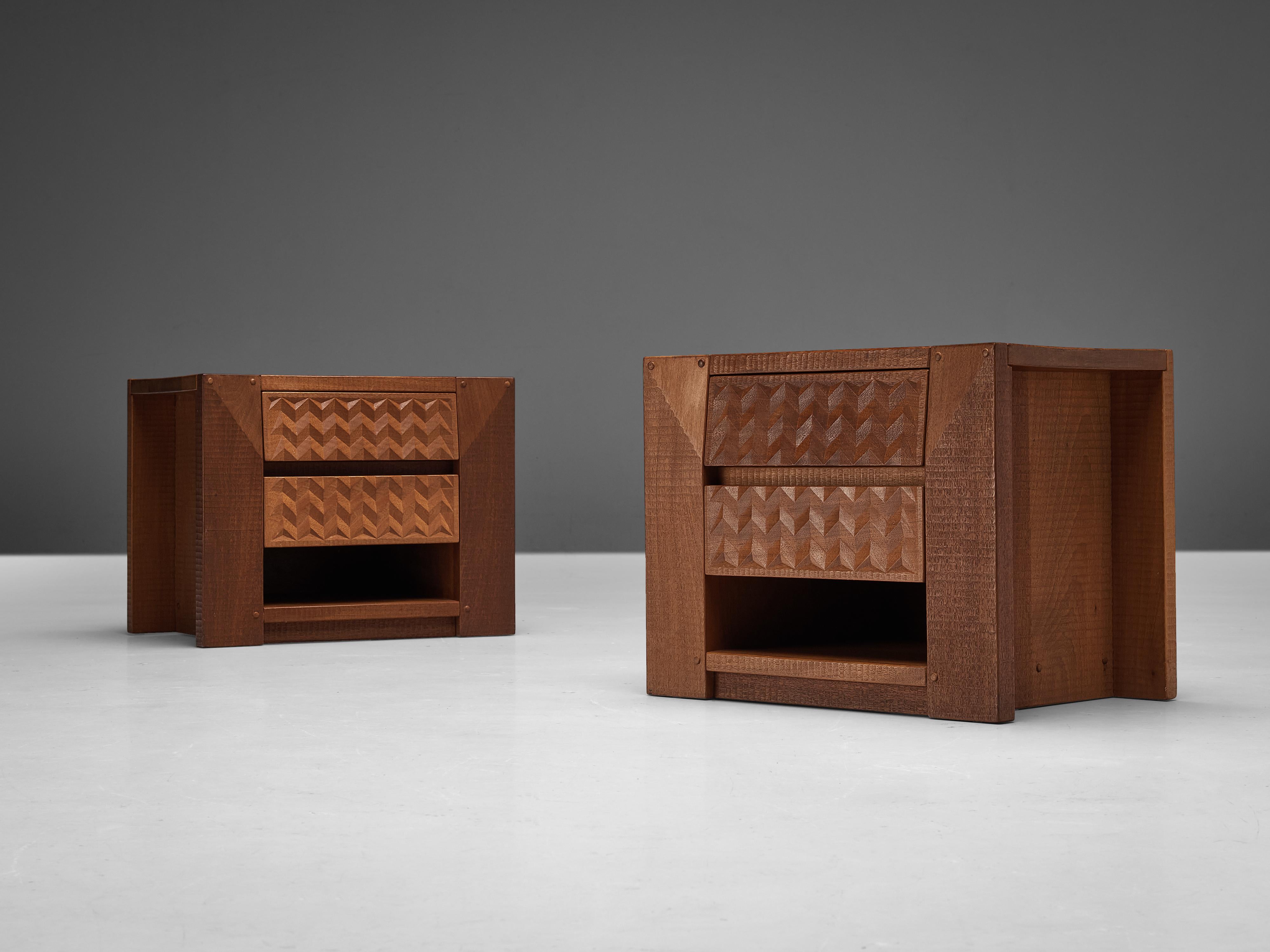 Giuseppe Rivadossi, nightstands in teak, Italy, 1980s

Pair of nightstands designed by the Italian sculptor and designer Giuseppe Rivadossi. This excellent set features a high-level of craftsmanship in woodwork. The stunning herringbone pattern on