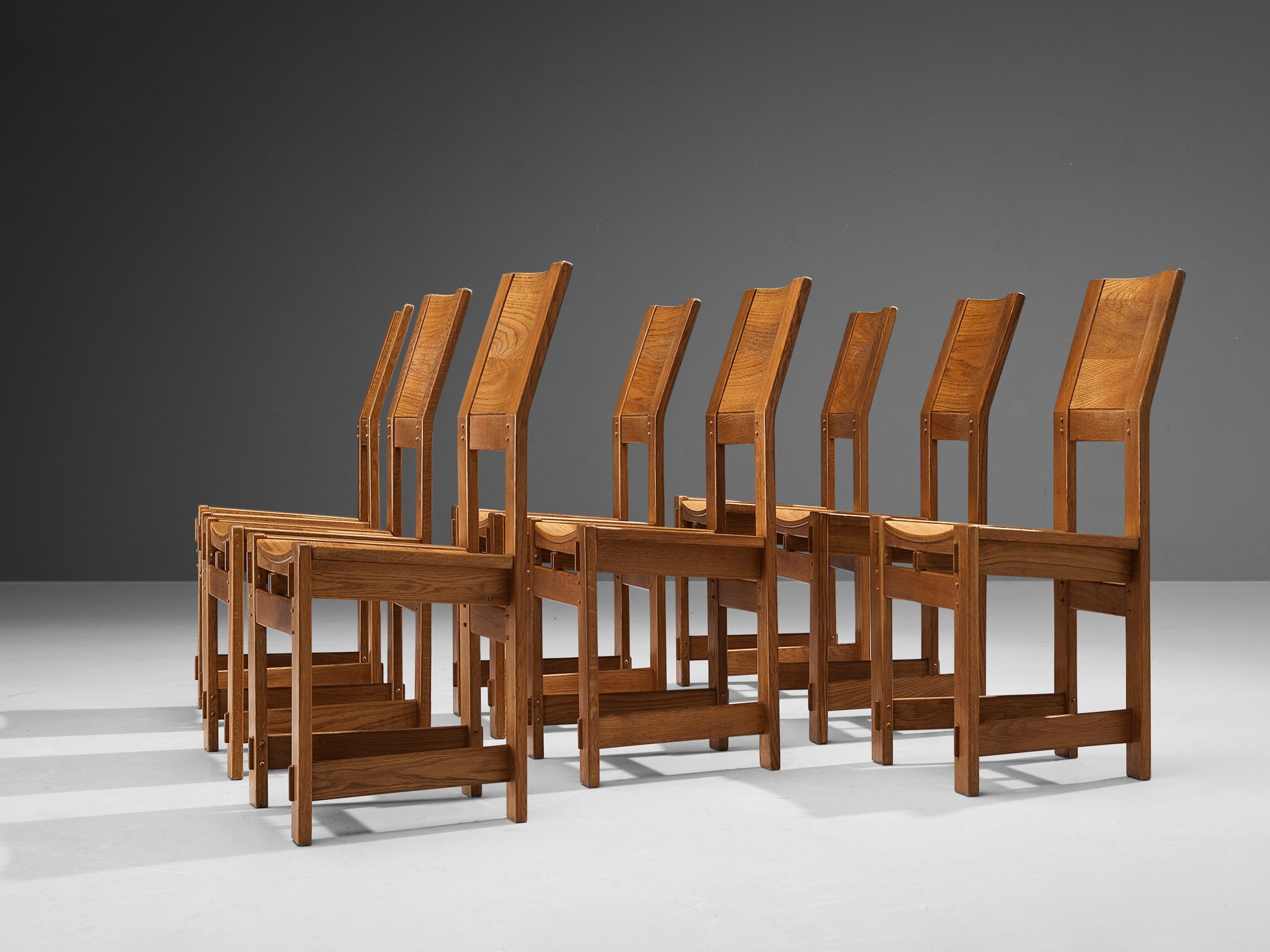 Mid-Century Modern Giuseppe Rivadossi ensemble de huit chaises de salle à manger en chêne en vente