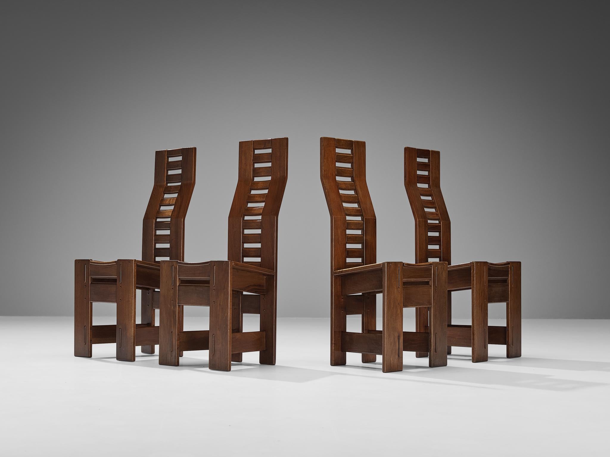Giuseppe Rivadossi for Officina Rivadossi, set of four dining chairs, walnut, Italy, circa 1980

An exceptional set of chairs by the Italian sculptor and designer Giuseppe Rivadossi, featuring a high level of craftsmanship in woodwork. The chairs