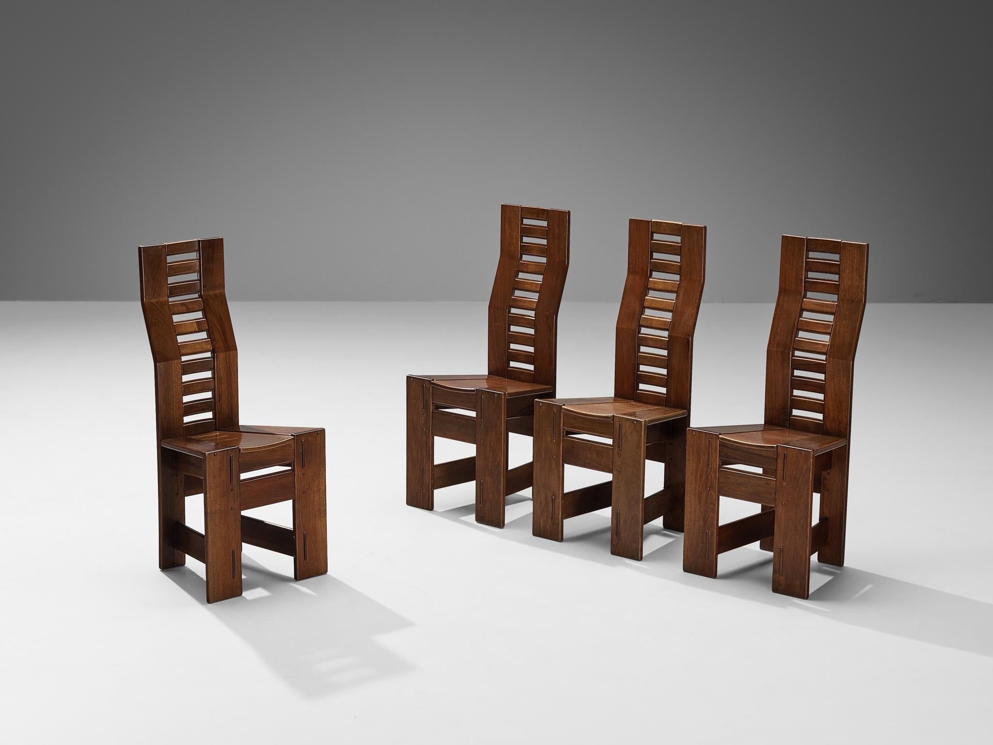 Giuseppe Rivadossi for Officina Rivadossi, set of four dining chairs, walnut, Italy, circa 1980

An exceptional set of chairs by the Italian sculptor and designer Giuseppe Rivadossi, featuring a high level of craftsmanship in woodwork. The chairs