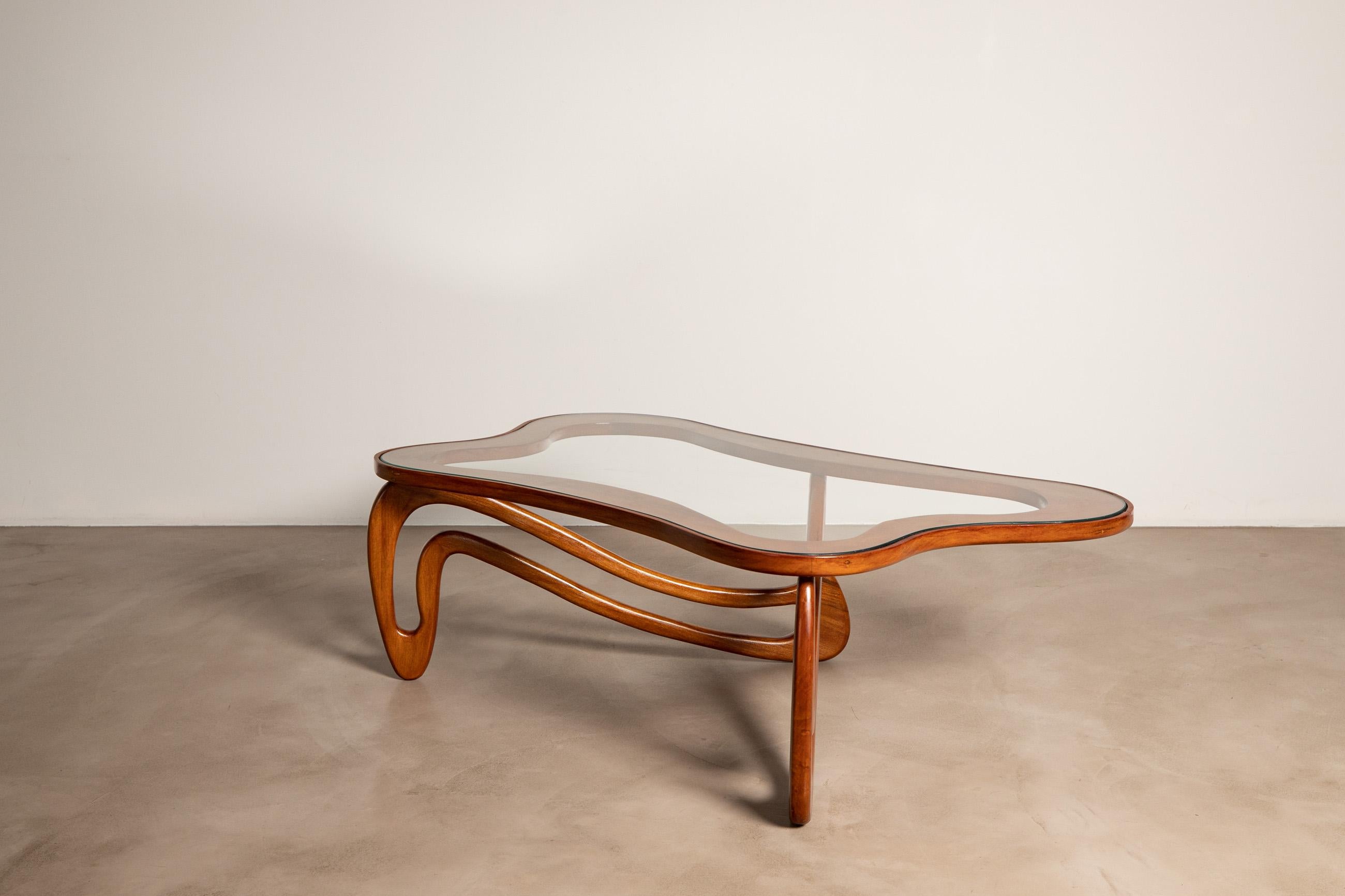 Curved ‘Agua’ coffee table by Giuseppe Scapinelli.
