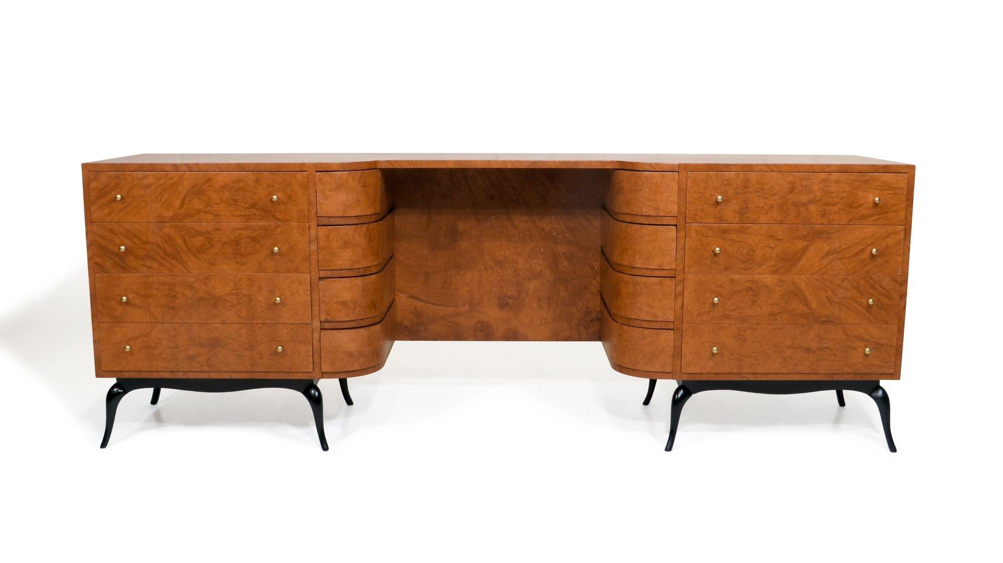 Stunning Giuseppe Scapinelli burled wood vanity dresser, 1958, Brazil. Expertly crafted with burled wood, eight drawers with brass pulls, open space in center and eight curved front drawers on either side. Raised on sculpted black lacquered legs. 
W