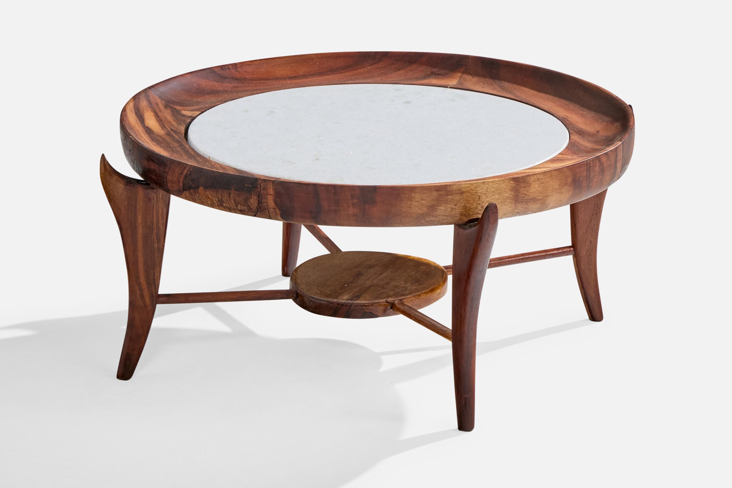 A wood and marble coffee table designed and produced by Giuseppe Scapinelli, Brazil, c. 1950s.

Dimensions: 12.75” H x 29.75” Diameter