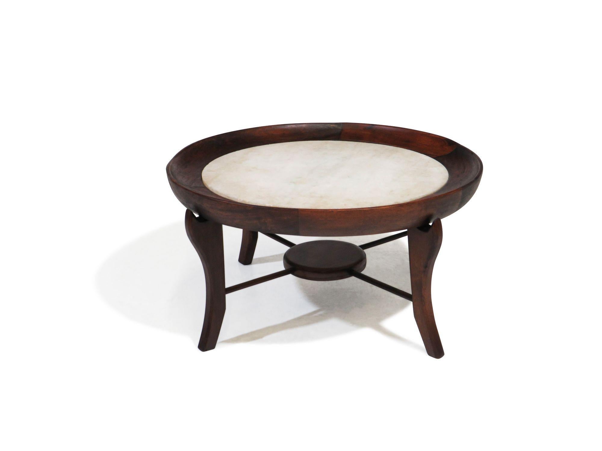 Brazilian Caviuna wood coffee table attributed Giuseppe Scapinelli. Round sculptural frame with marble top surface.