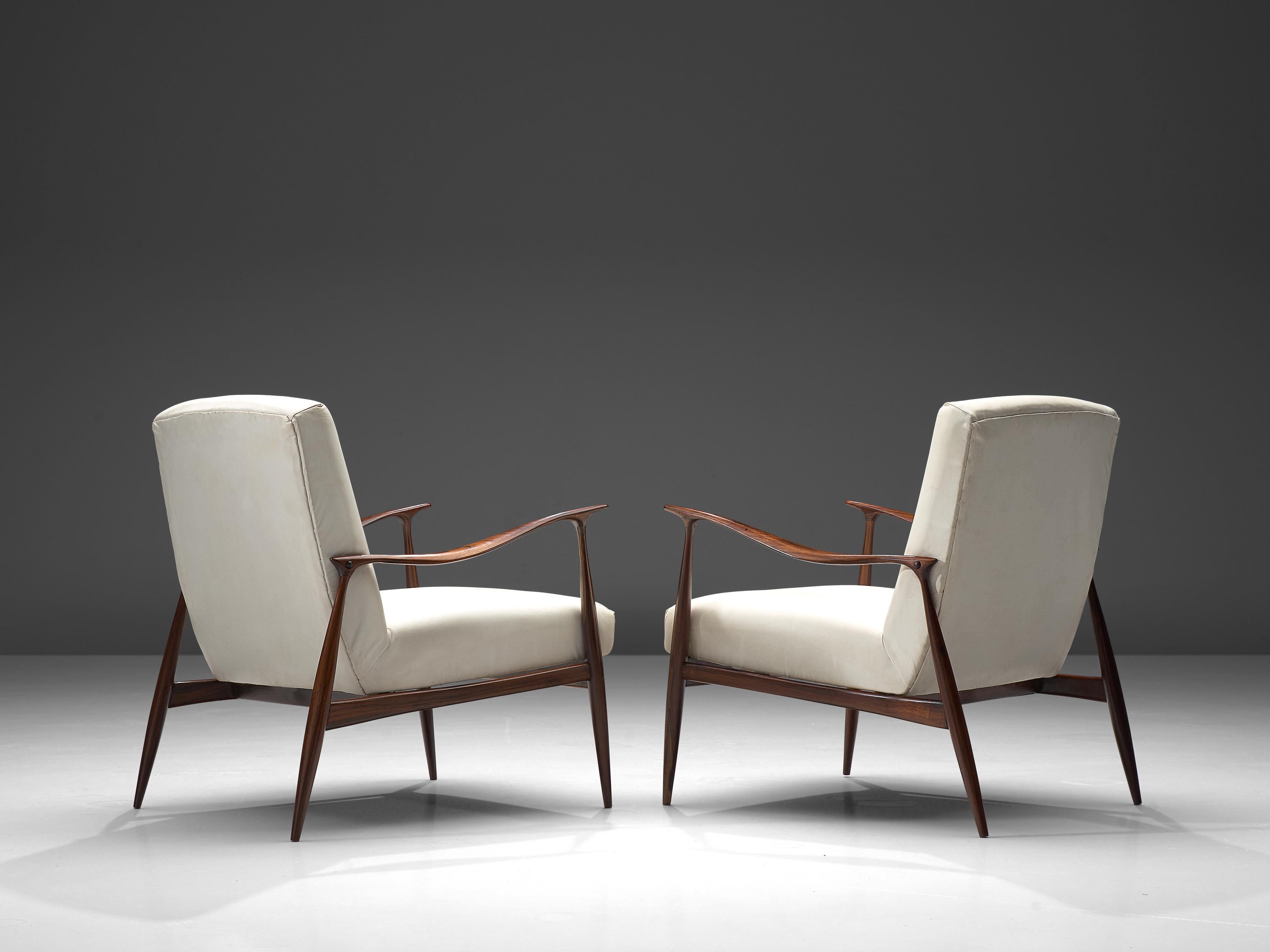 Giuseppe Scapinelli, set of 2 'Paltrona' armchairs, rosewood and leatherette, Brazil, 1950s.

Elegant pair of easy chairs by Brazilian designer Giuseppe Scapinelli. This chair in Caviuna wood exposes the beautiful grain of the wood in an eloquent