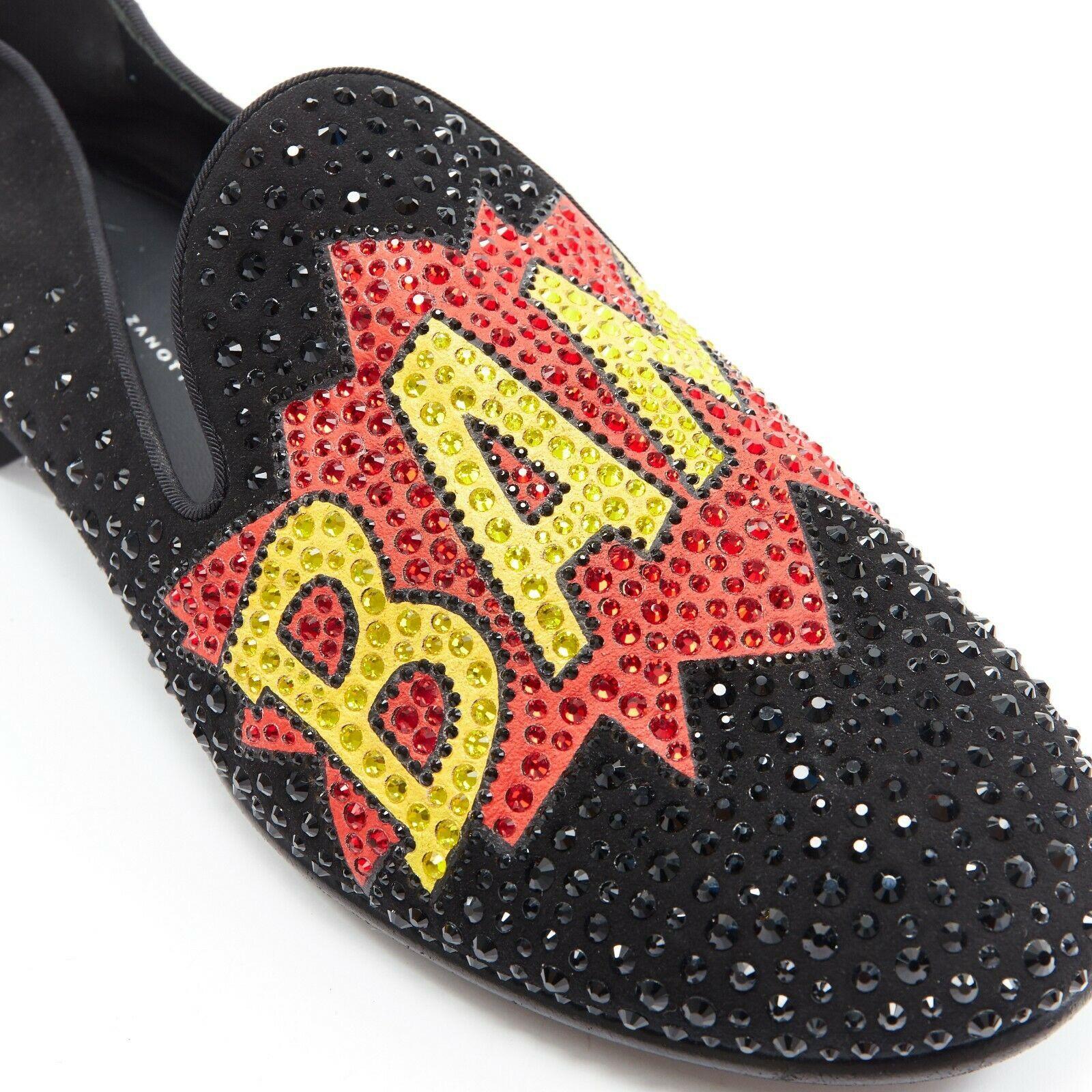 GIUSEPPE ZANOTTI 2019 Bam crystal embellished pop art black suede loafer EU44
GIUSEPPE ZANOTTI
FROM THE SPRING SUMMER 2019 COLLECTION
Black suede leather upper. 
Pop art inspired Bam! graphic. 
Rhinestone crystal embellishment. 
Round toe.