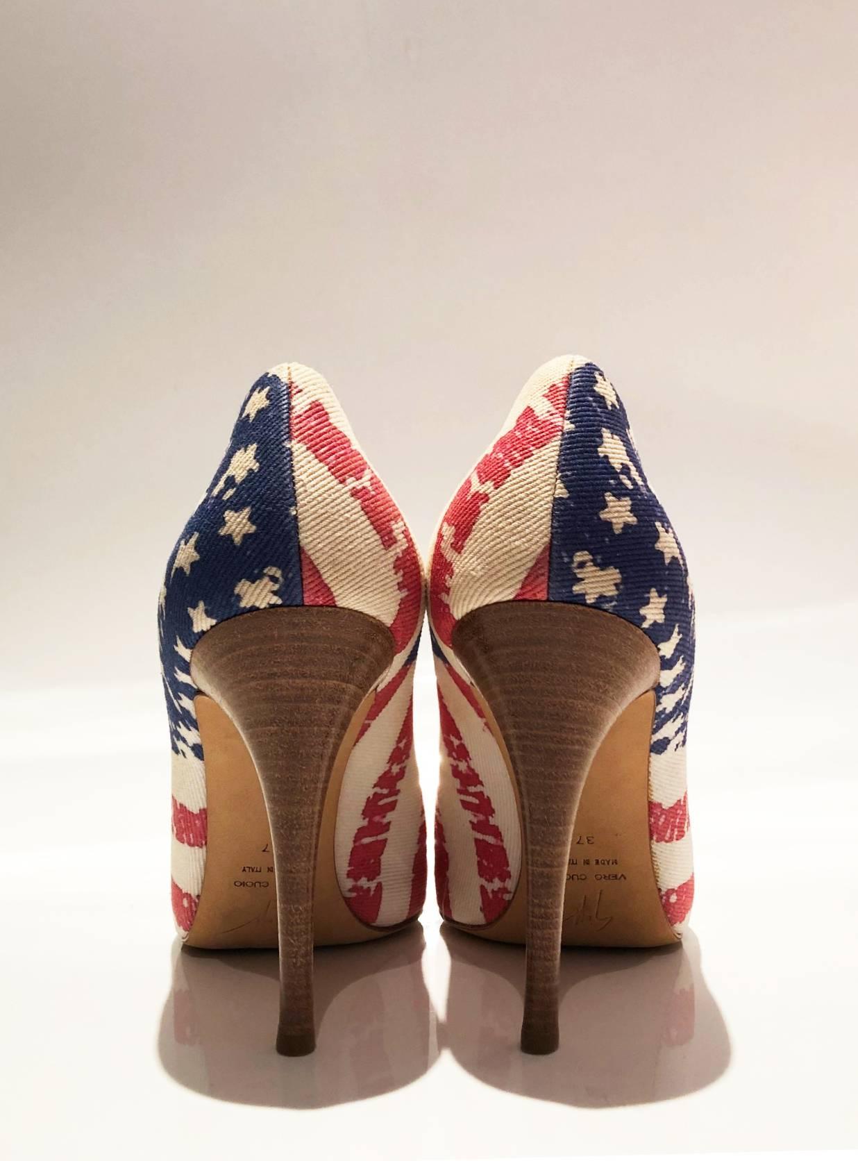 FREE UK and WORLDWIDE DELIVERY 

Giuseppe Zanotti USA flag platform heels pumps, printed cloth, inside platform, wooden heels

Size: 37 Italian / 4 UK / 7 USA
Platform height: 1.5 cm 
Heel height: 11 cm 
Condition: 2000s, very good, never worn, just