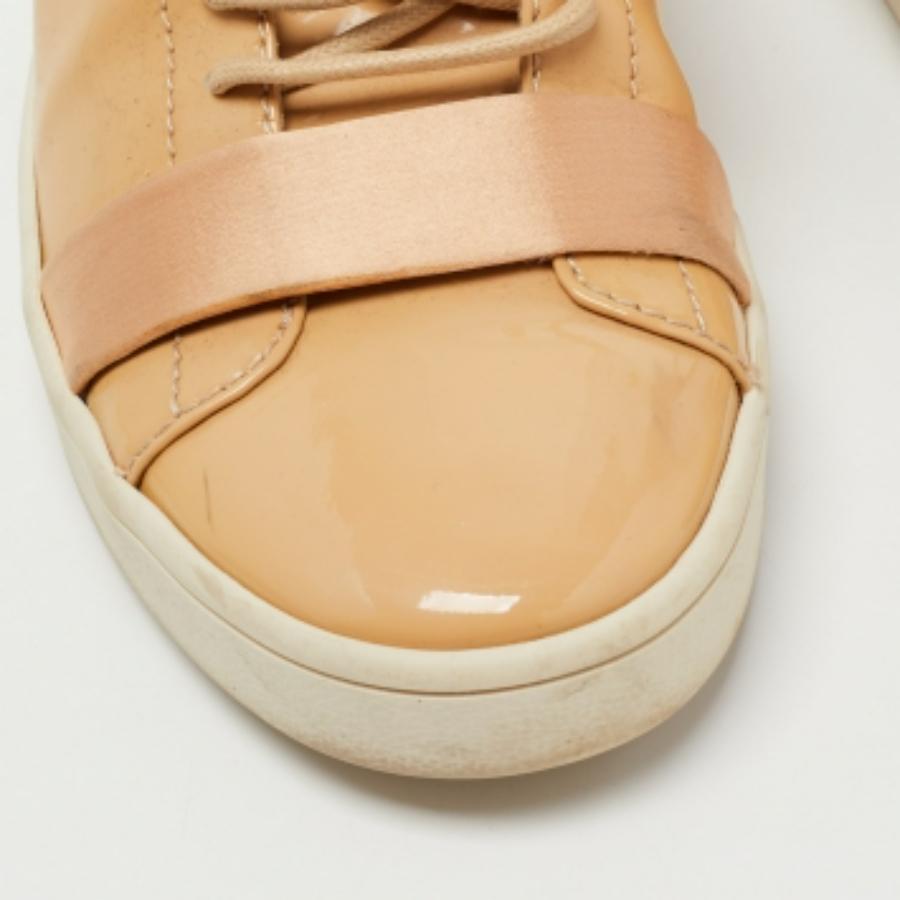Baskets basses Giuseppe Zanotti en cuir verni beige, taille 37 Pour femmes en vente