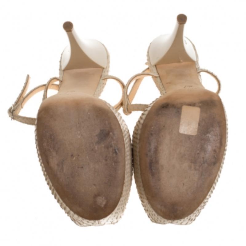 Giuseppe Zanotti Sandalias de plataforma con tira en T de piel de pitón beige talla 41 en venta 2