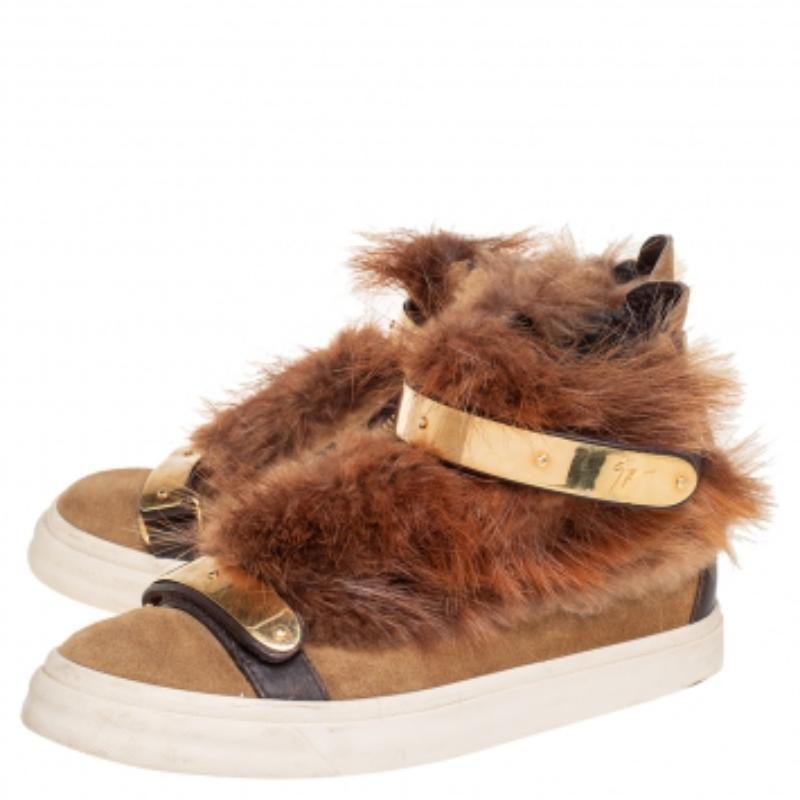 These sneakers by Giuseppe Zanotti are meant to be flaunted. Crafted from suede and leather, they feature gorgeous fur-covered vamps, a high-top style with gold-tone zipper detail at the rear, and velcro straps on the toes and ankles. Step out in