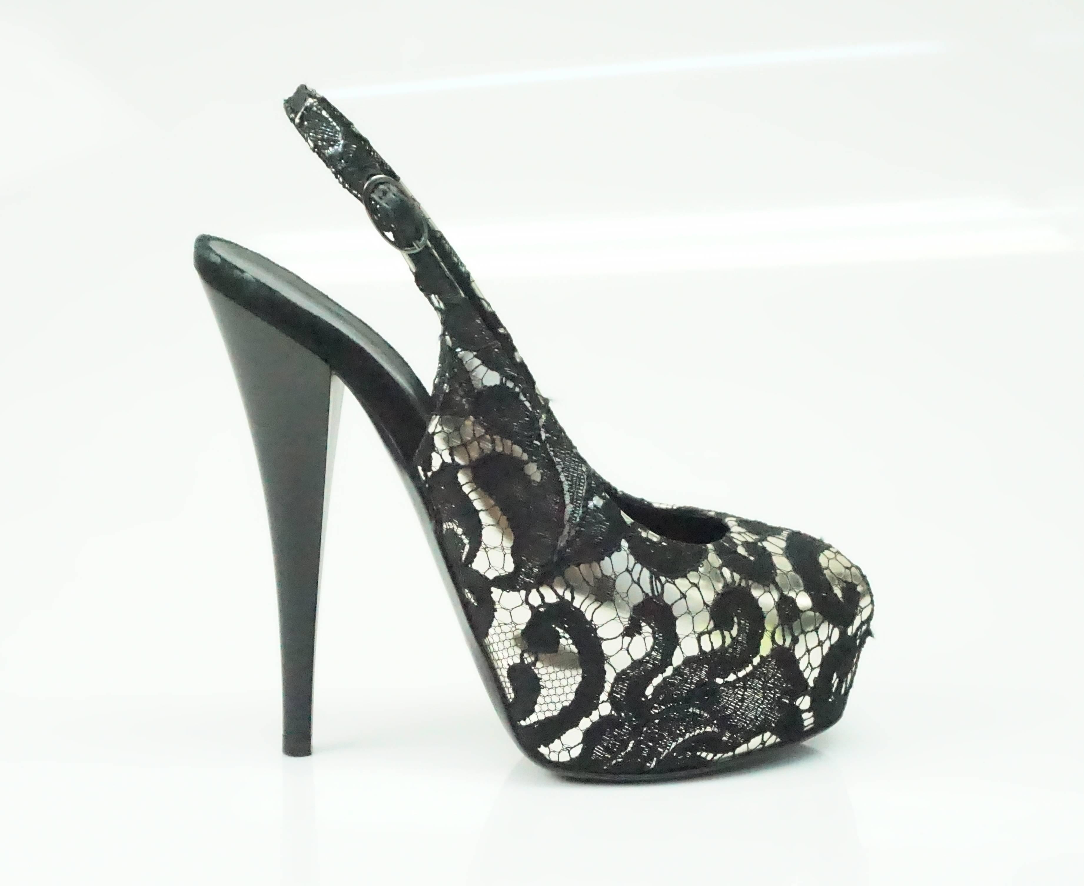 Giuseppe Zanotti Black and Brushed Gold Leather and Lace Slingback Pumps - 36.5  These unique and fabulous platform heels are slingback, have a small peeptoe and the brushed gold leather is covered in a black lace. These shoes are in excellent