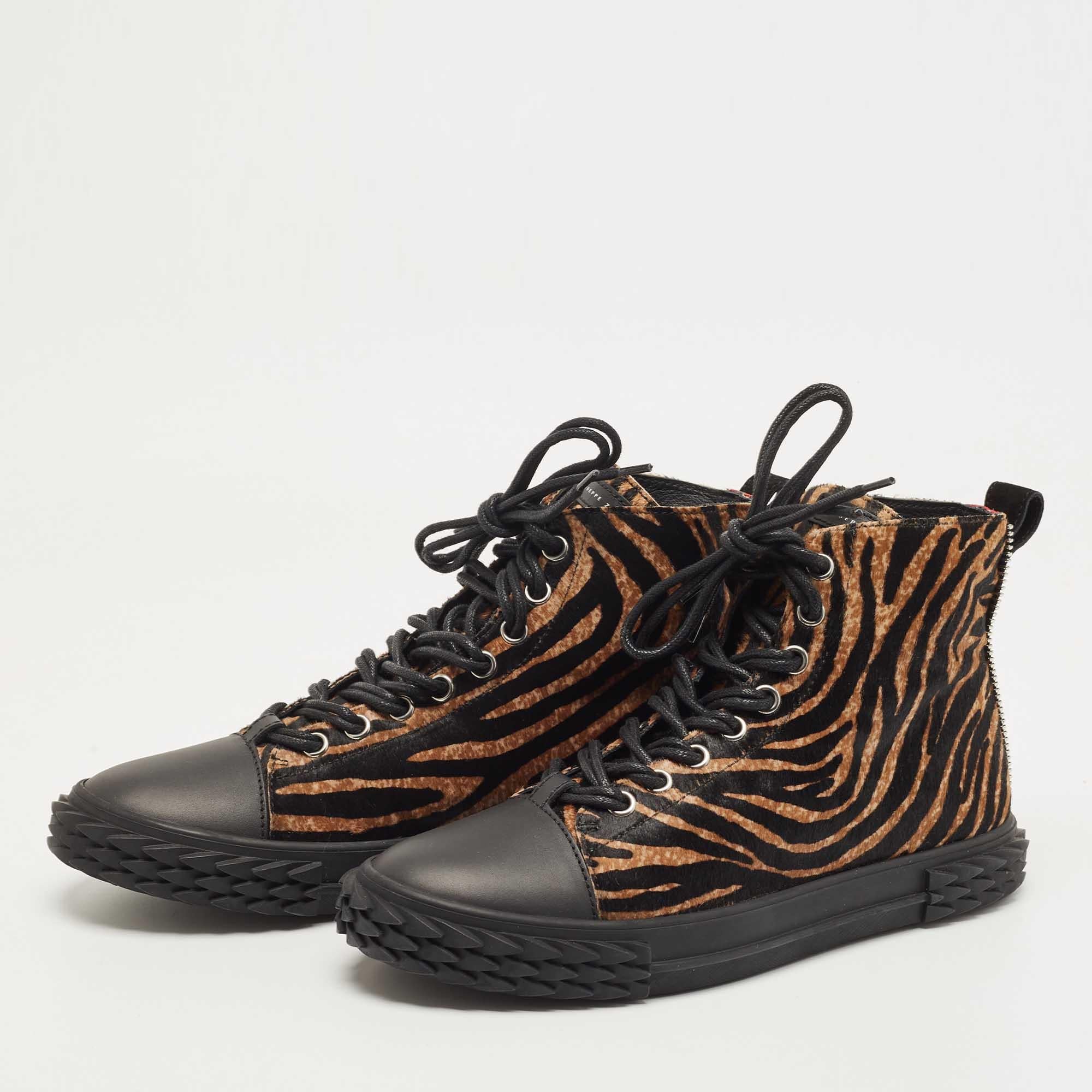 Add a statement appeal to your outfit with these Giuseppe Zanotti sneakers. Made from premium materials, they feature lace-up vamps and relaxing footbeds. The rubber sole of this pair aims to provide you with everyday ease.

