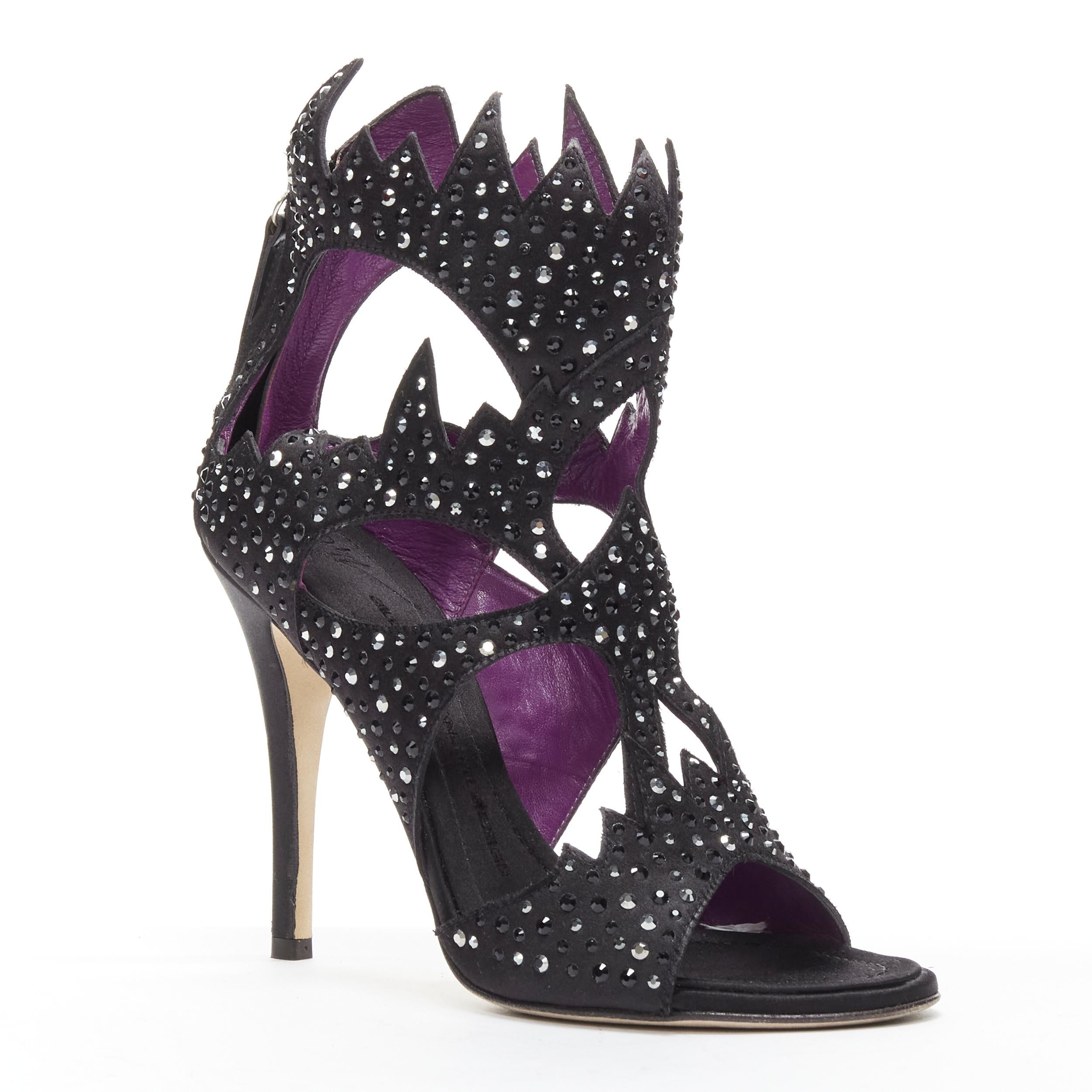 GIUSEPPE ZANOTTI black crystal embellished satin cutout sandals heels EU37.5
Reference: GIYG/A00266
Brand: Giuseppe Zanotti
Material: Satin
Color: Black, Purple
Pattern: Solid
Closure: Zip
Lining: Purple Leather
Made in: Italy

CONDITION:
Condition: