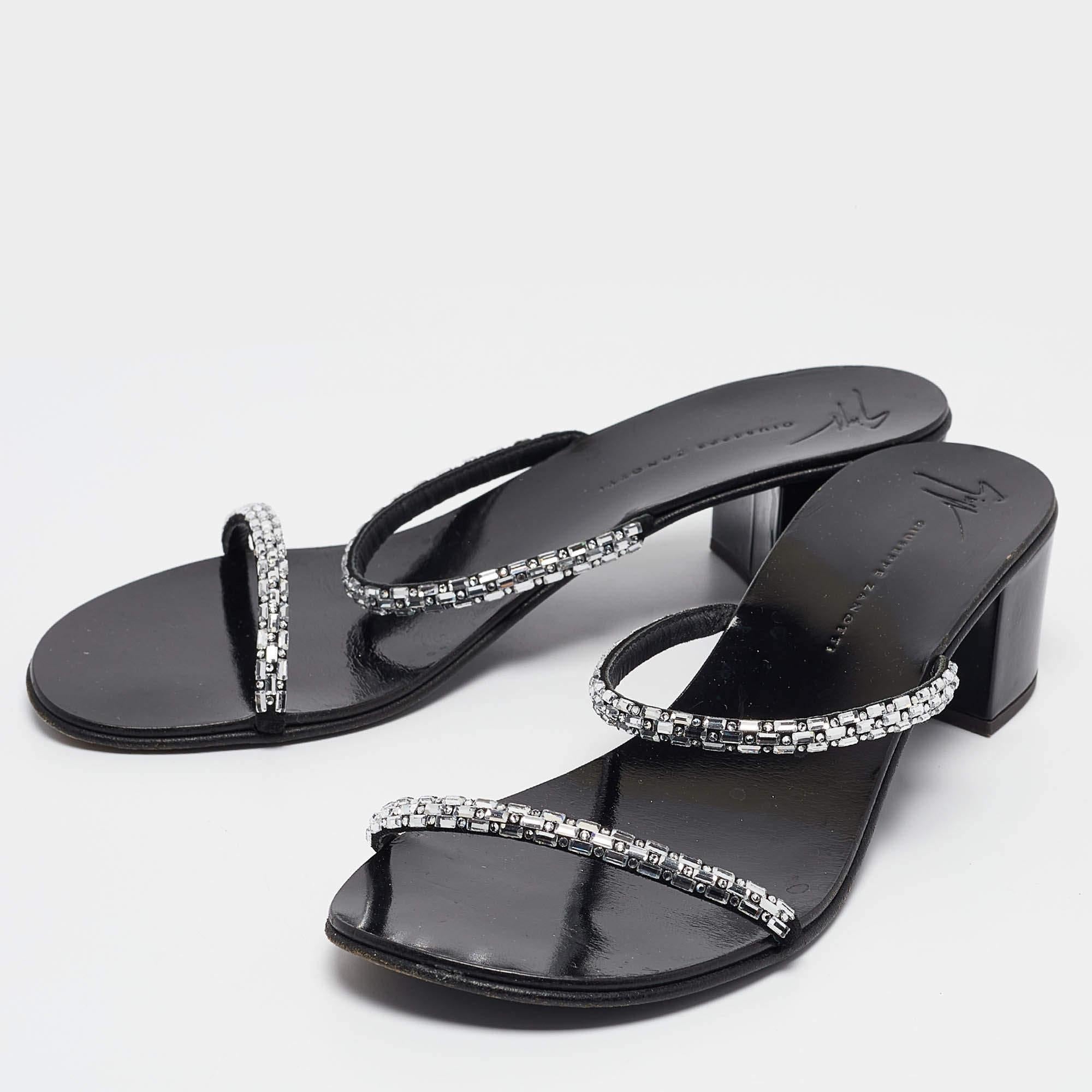 The sandals to invest in this season are these. Meticulously crafted  these exquisite Giuseppe Zanotti slides combine luxury and comfort  creating a statement pair thats both fashionable and fabulous for every occasion.