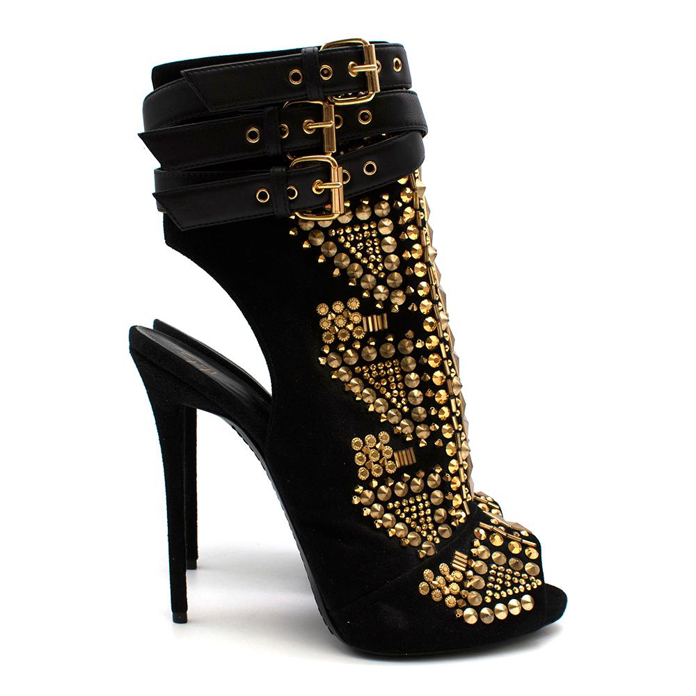 Giuseppe Zanotti Black Stud Embellished Stiletto Boots

- Soft black suede on the base of the shoes
- Embellished with a mixture of gold studs and shiny embellishments
- Peep toe finish 
- Three leather ankle straps with gold buckle hardware
- Side
