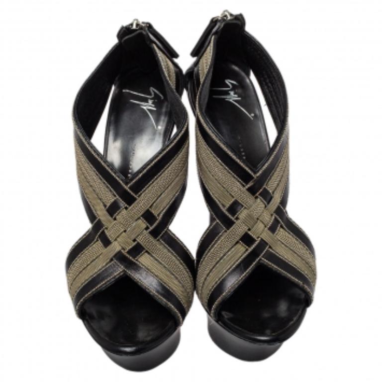 Keep your style quotient at a maximum with these beautiful sandals. This pair comes with a cross strap accented with chains and features a 14 cm heel. This adorable pair by Giuseppe Zanotti will add a touch of poise outshining your inner diva. This