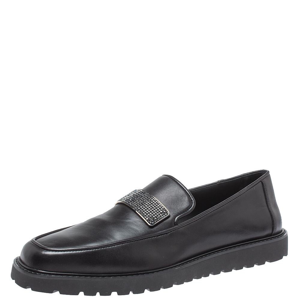 These slip-on loafers from Giuseppe Zanotti are simply luxe. Crafted from black leather, they feature round toes and crystal-embellished plaques on the vamps. They are endowed with comfortable leather-lined insoles and durable rubber