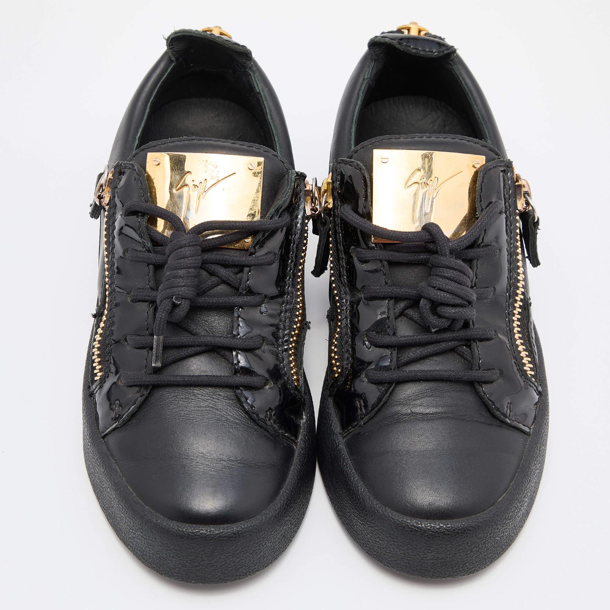 Sneakers are the best way to experience total comfort and luxury. These Gail sneakers from Giuseppe Zanotti are super sturdy and stylish. They are crafted from black leather into a low-top profile. They showcase lace-ups, zipper fastening, and