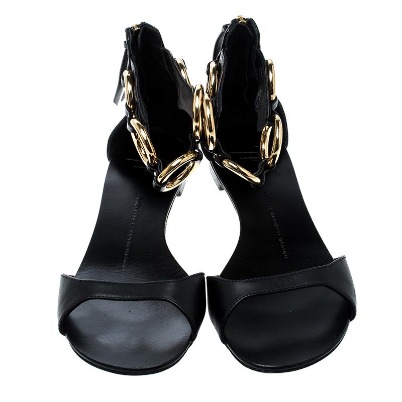 Simple and stylish, these Guiseppe Zanotti sandals are perfect for the season. They have been designed with leather and decorated with closed backs with zippers and gold-tone rings around the ankles. Wear them with maxi dresses and cotton jumpsuits