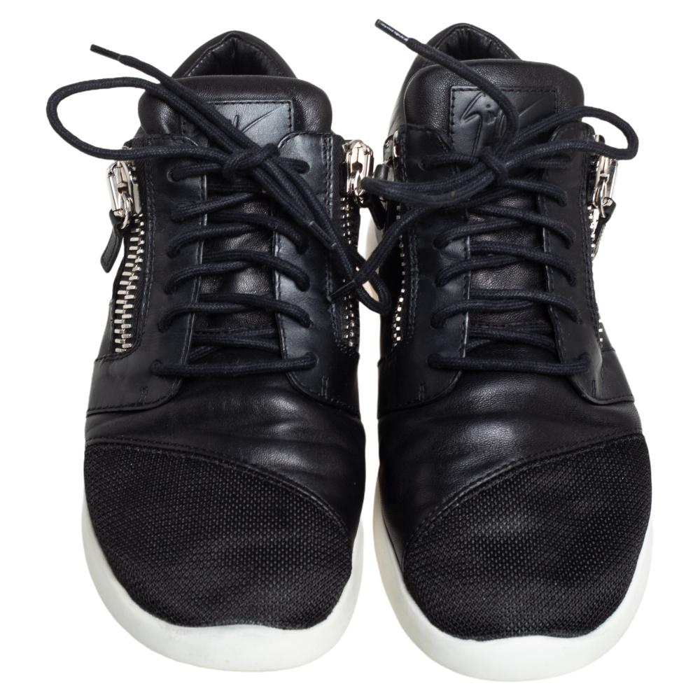 These sneakers are the epitome of class and sophistication. The kicks look chic because of their zipper details. Flaunt a stylish look every time you head out wearing these trendy Giuseppe Zanotti sneakers made from a blend of quality materials.


