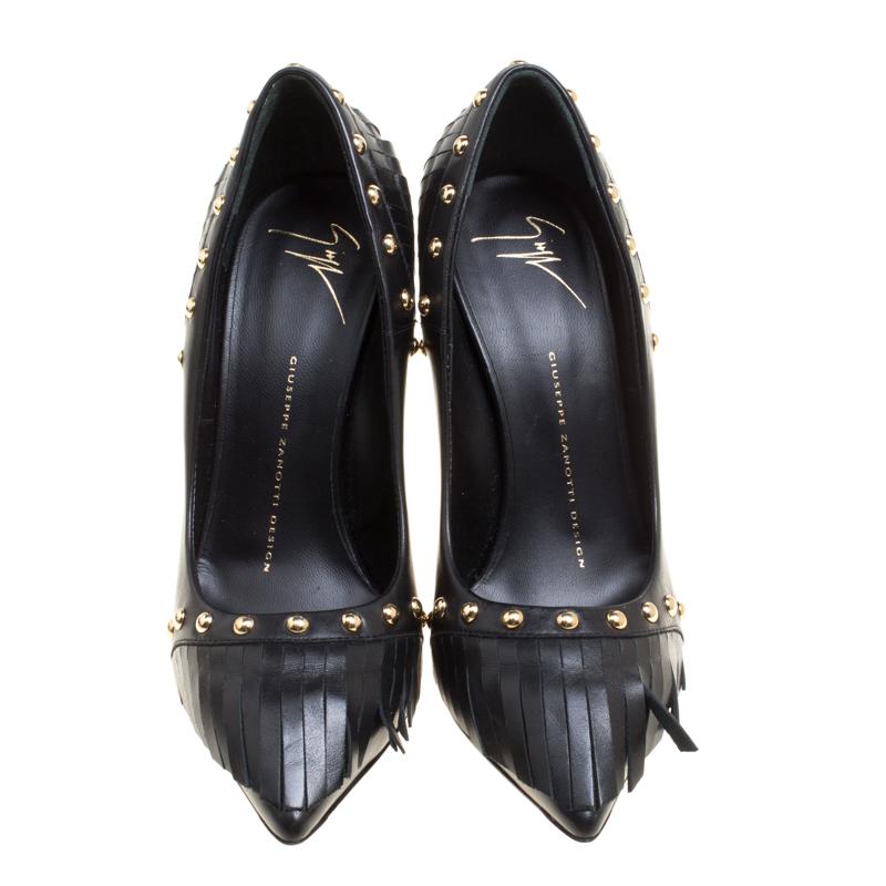 Strut in style and make the streets your fashion runway with these spectacular black pumps from Giuseppe Zanotti. They are crafted from leather and feature an 11.5 cm heel, pointed toes and lovely fringe detailing at the front and back. These
