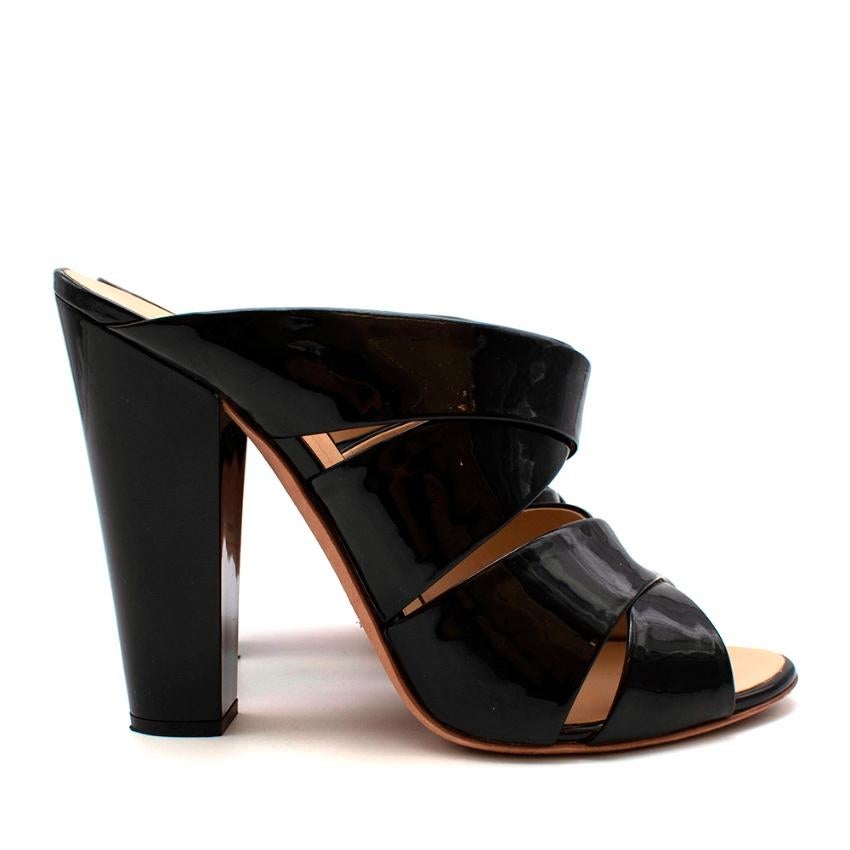 Giuseppe Zanotti Black Patent Leather Heeled Mules

-Beautiful patent leather 
-Luxurious soft leather lining 
-Chunky heel for stability 
-Crossing straps timeless design 
-Neutral style 

Materials:
Main- patent leather 
Lining. leather 
Soles-